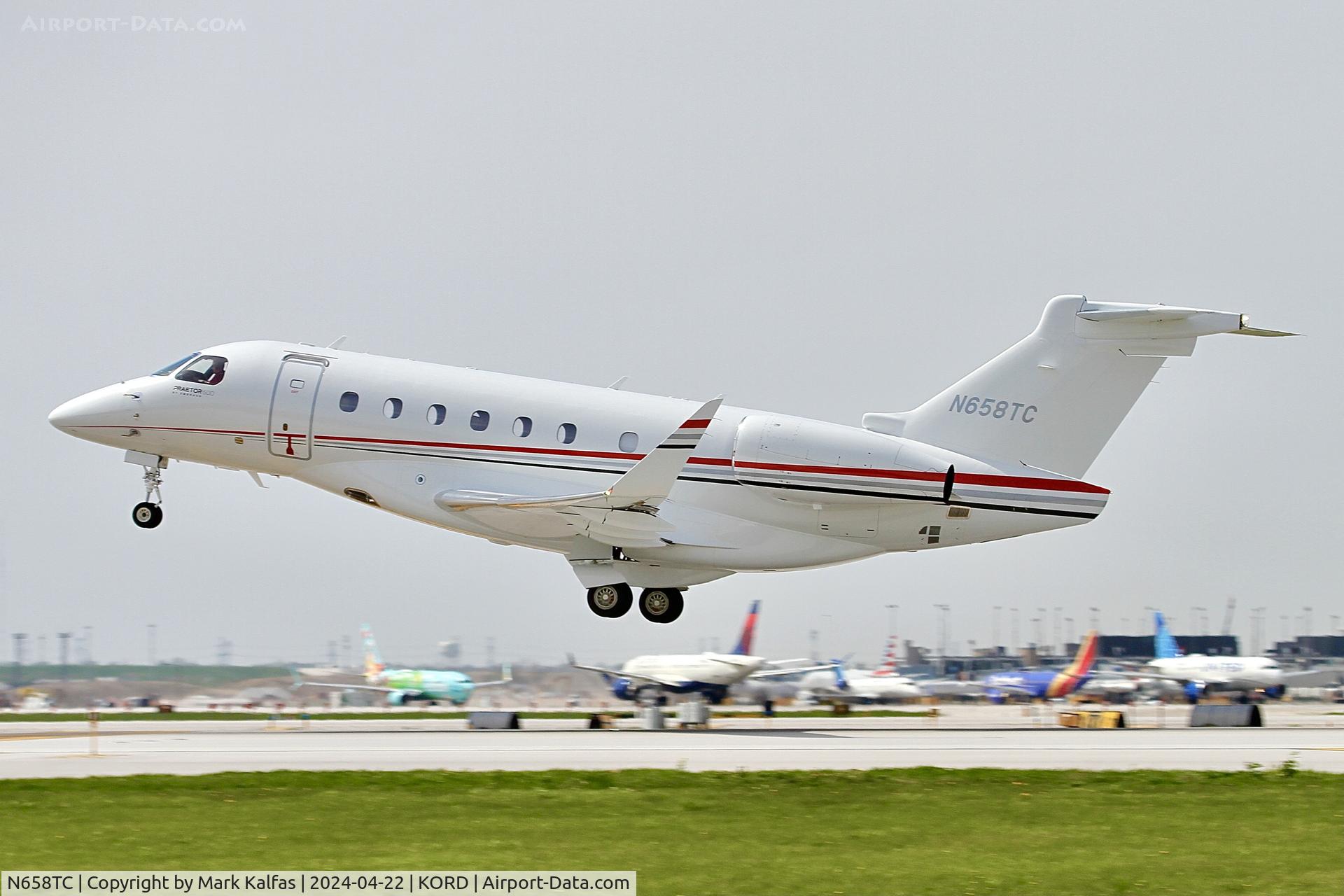 N658TC, 2023 Embraer EMB-550 C/N 55020194, E550 TRAVEL YONDER CO LLC Embraer EMB-550 PRAETOR 600, N658TC departing 22L KORD