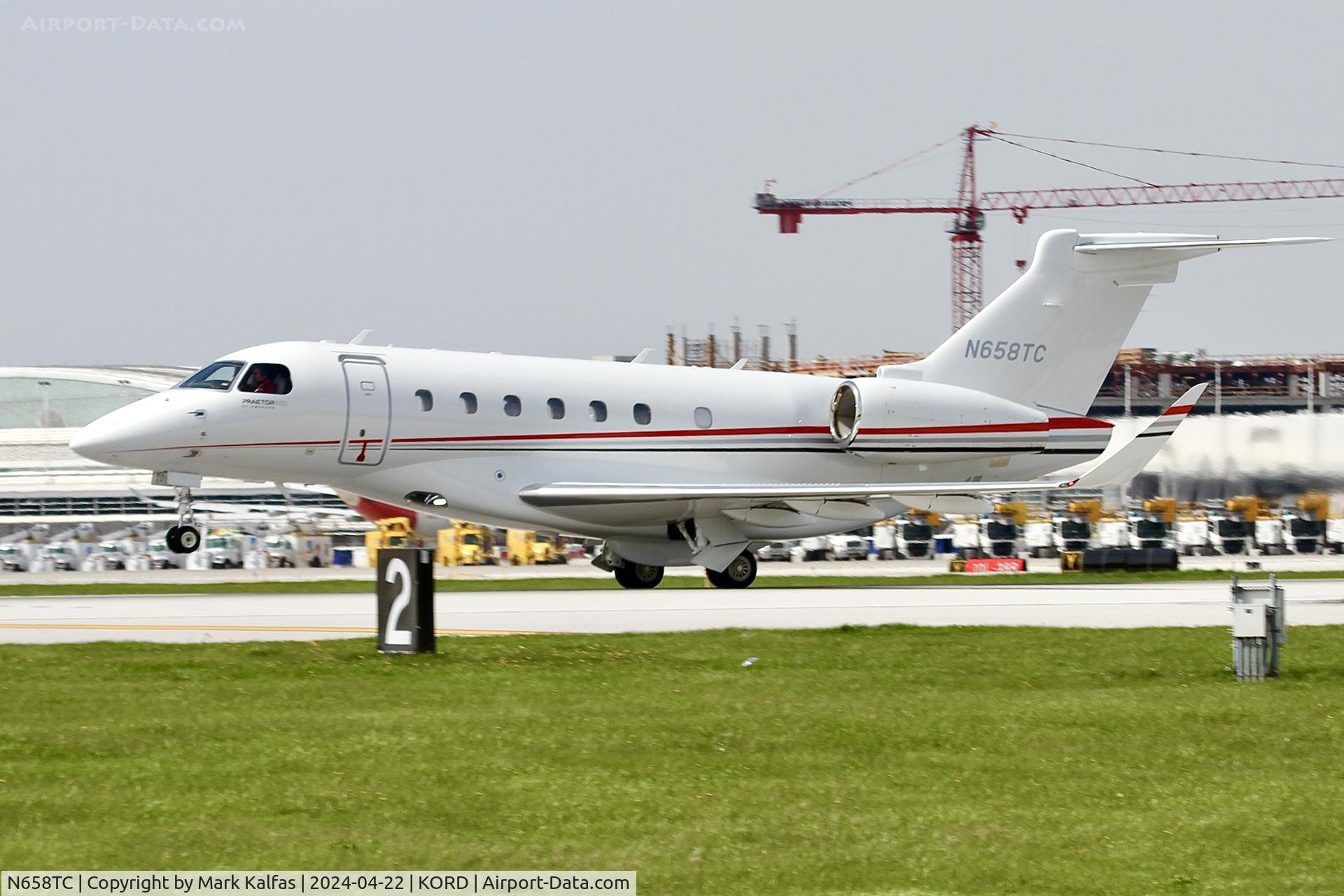N658TC, 2023 Embraer EMB-550 C/N 55020194, E550 TRAVEL YONDER CO LLC Embraer EMB-550 PRAETOR 600, N658TC departing 22L KORD