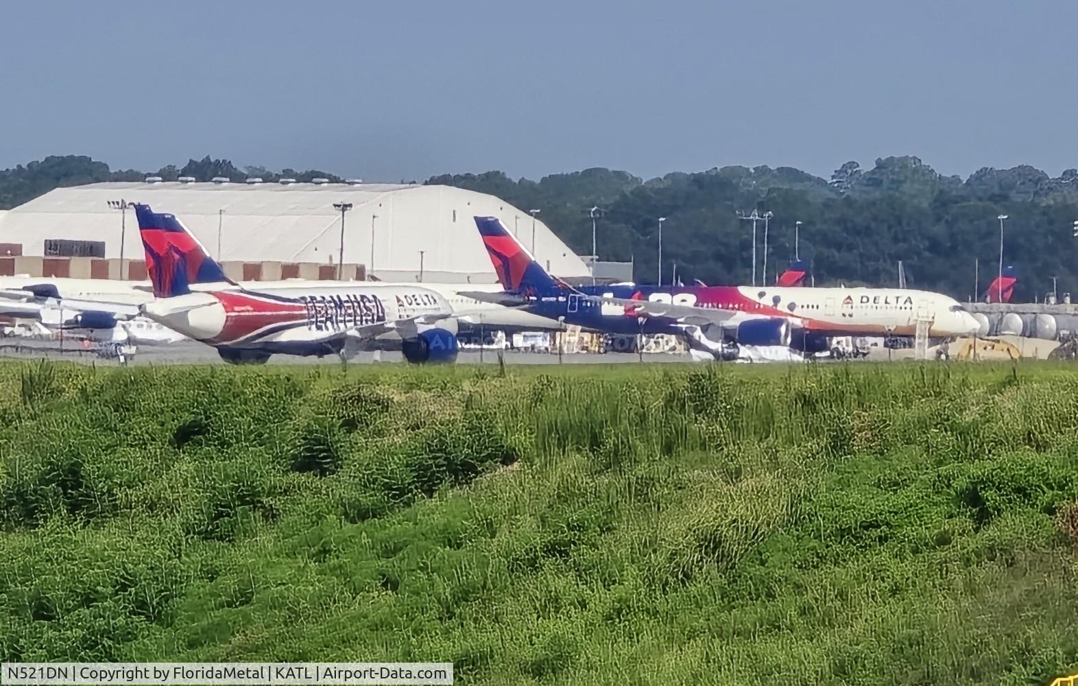 N521DN, 2024 Airbus A350-941 C/N 661, DAL A359 Team USA zx Both special paint A350s next to each other.  Wish I had stayed at the Renaissance hotel that night.