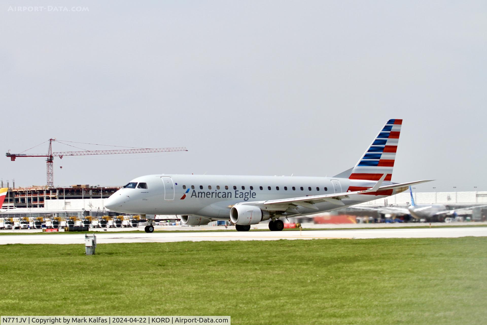 N771JV, 2006 EMBRAER 170LR C/N 87, E170 Envoy/ American Eagle EMBRAER ERJ 170-100 LR N771JV departing 22L KORD