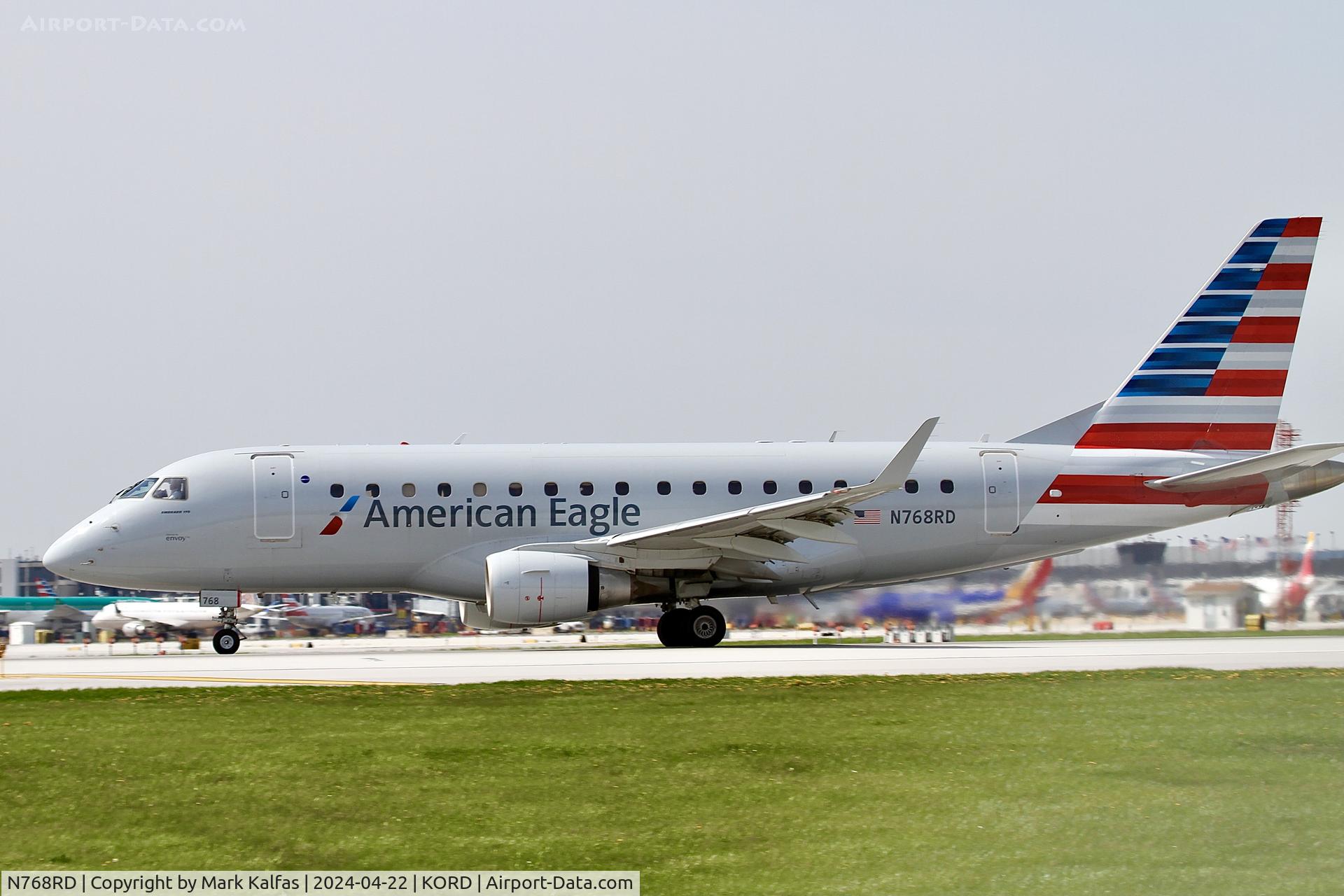 N768RD, 2008 Embraer 170LR (ERJ-170-100LR) C/N 17000230, E170 Envoy/ American Eagle EMBRAER ERJ 170-100 LR N768RD departing 22L KORD