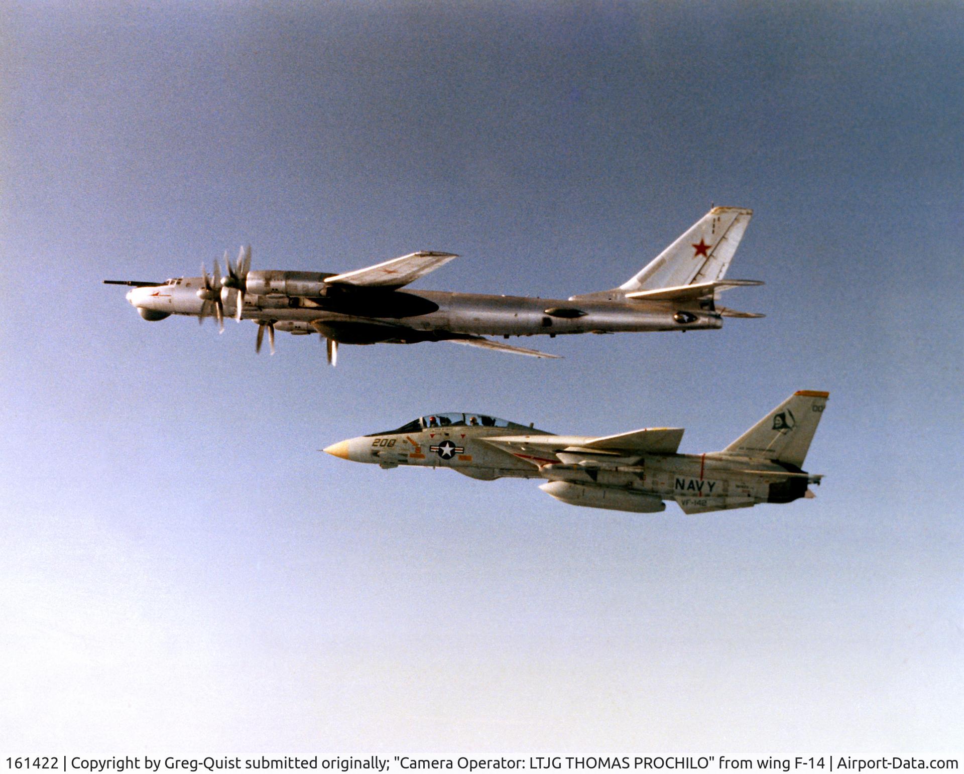 161422, Grumman F-14A Tomcat C/N 432, >>Soviet Tu-95 Bear maritime recon aircraft escorted by U.S. Navy F-14 TOMCAT as the Soviet aircraft approached the Carrier Battle Group. LCDR Greg Quist pilots the VF-142 TOMCAT<< - BuNo 161422; now at NAS Wildwood Museum, NJ. CDR (ret) G. Quist submits
