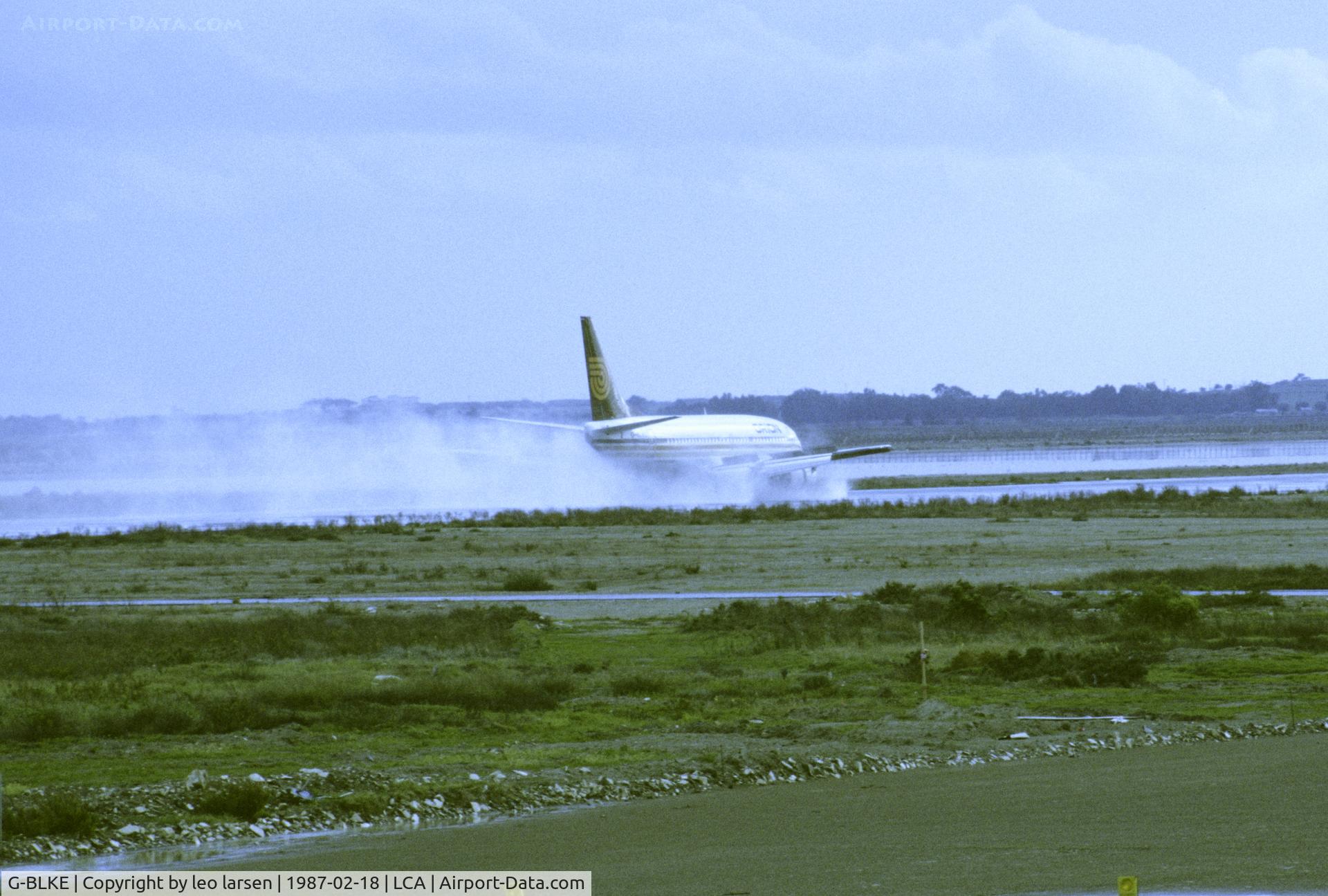 G-BLKE, 1985 Boeing 737-3T5 C/N 23063, Larnaca 18.2.1987 landing on wet runway