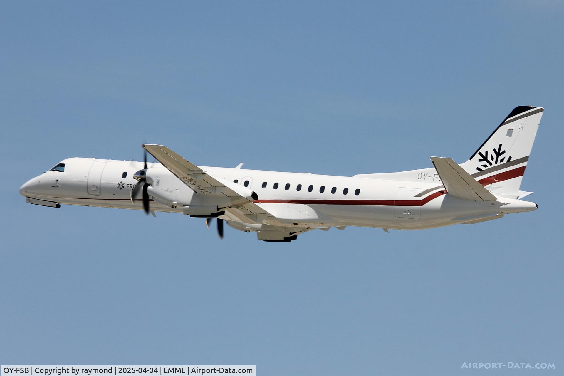 OY-FSB, 1995 Saab 2000 C/N 2000-013, Saab 2000 reg OY-FSB of FROST on take off RW31 from Malta enroute to Benghazi.