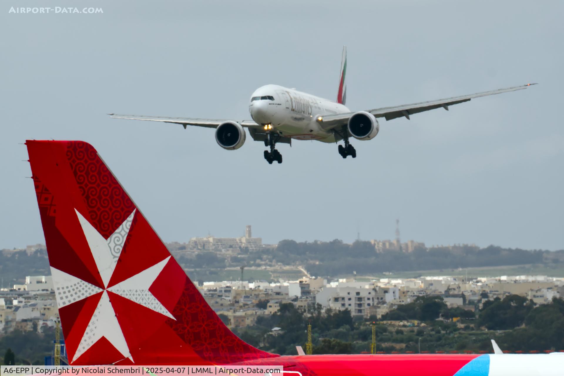 A6-EPP, 2016 Boeing 777-300/ER C/N 42335, A6-EPP landing RWY 13 with 9H-NEB in the foreground