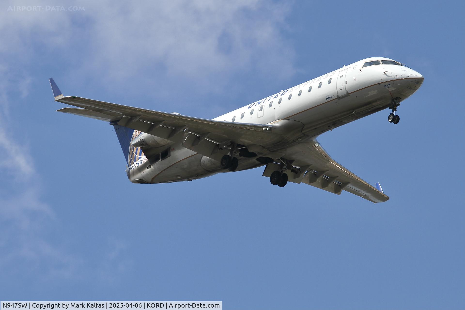 N947SW, 2003 Bombardier CRJ-200LR (CL-600-2B19) C/N 7786, CRJ2 Skywest/United Express Bombardier CL-600-2B19 N947SW, on approach 10R KORD
