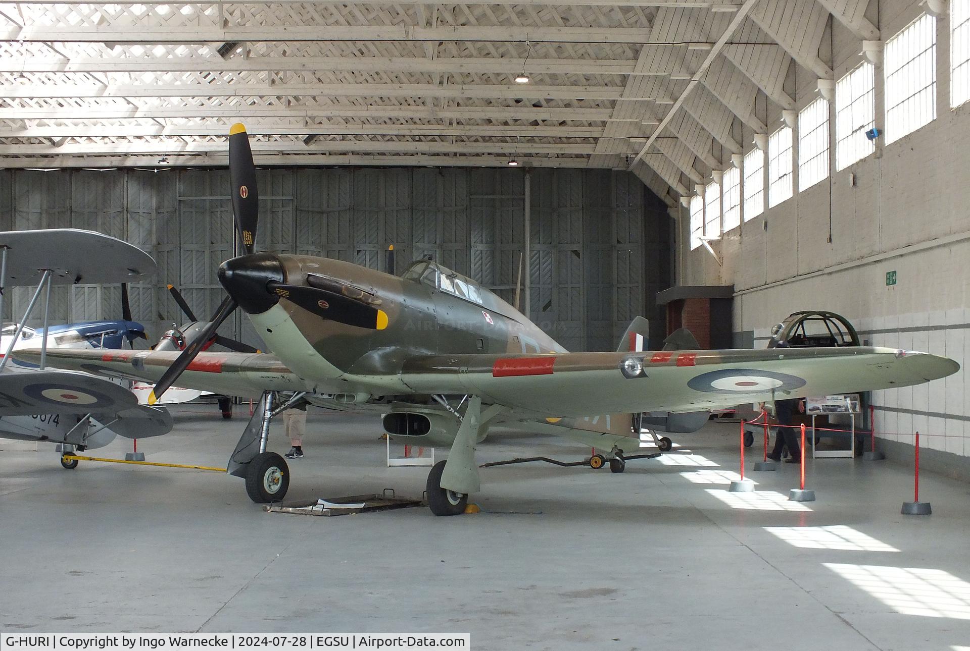 G-HURI, 1942 Hawker (CCF) Hurricane Mk12A C/N 72036, Hawker (CCF) Hurricane Mk XII A (now displayed as P3935/D-WX (port side) and P2954/WX-E (stb side) at the IWM and other collections, Duxford