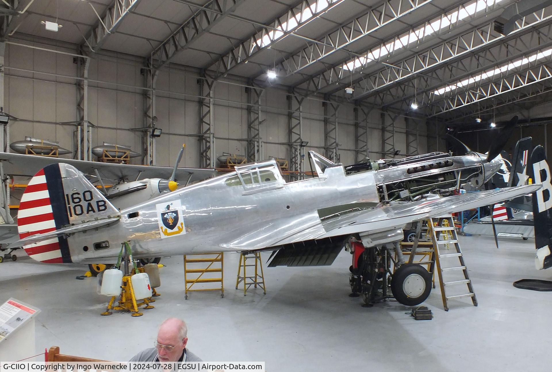 G-CIIO, 1941 Curtiss P-40C Warhawk C/N 16161, Curtiss P-40C Warhawk undergoing maintenance at the IWM and other collections, Duxford