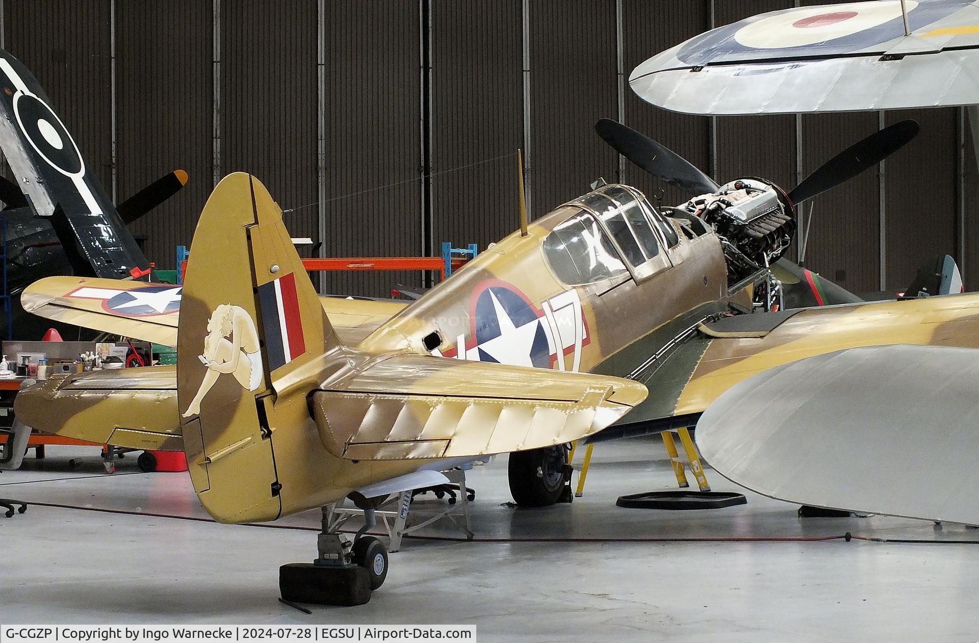 G-CGZP, 1942 Curtiss P-40F Warhawk C/N 19503, Curtiss P-40F Warhawk undergoing maintenance at the IWM and other collections, Duxford