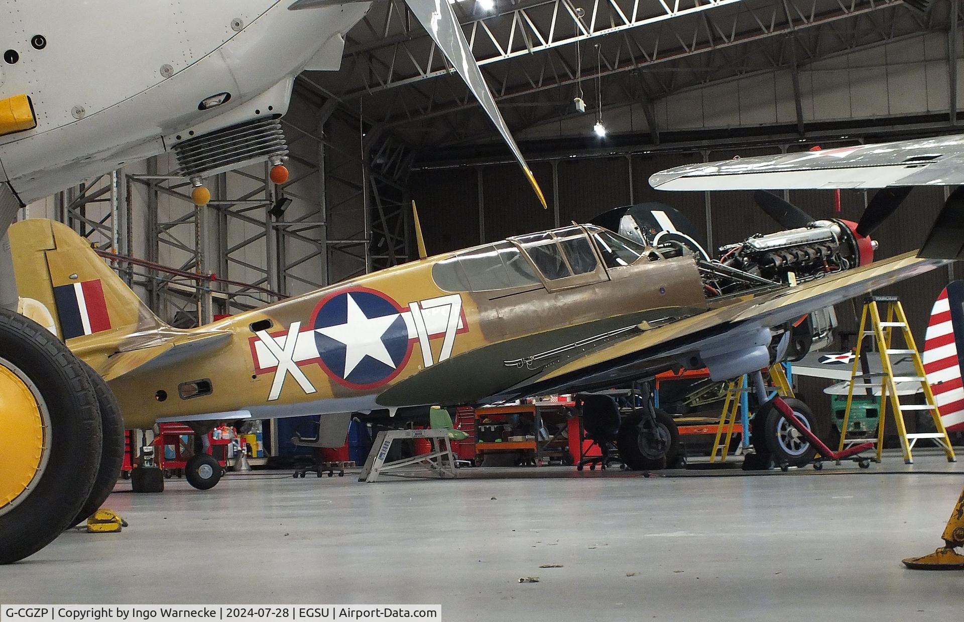 G-CGZP, 1942 Curtiss P-40F Warhawk C/N 19503, Curtiss P-40F Warhawk undergoing maintenance at the IWM and other collections, Duxford