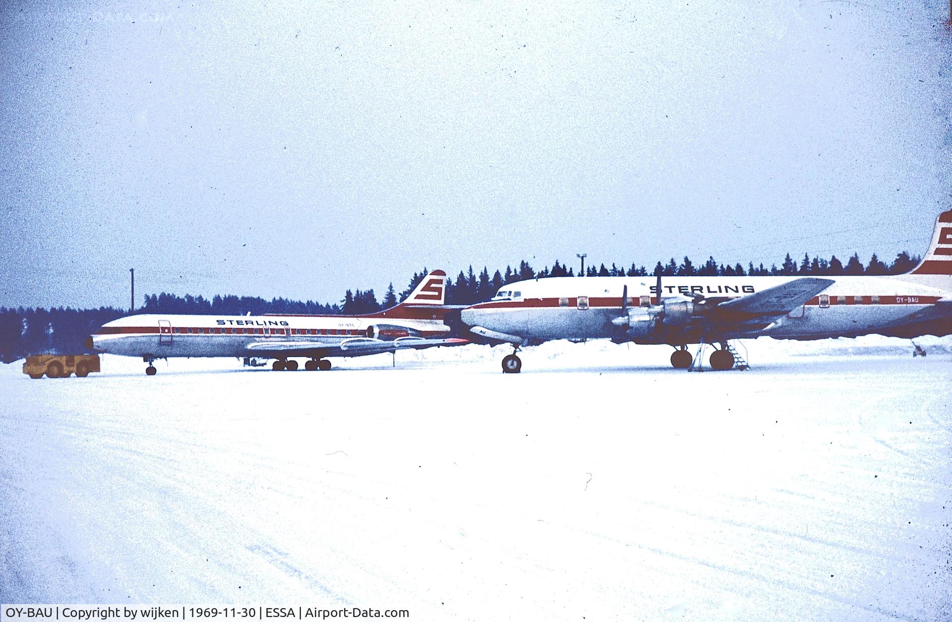 OY-BAU, 1957 Douglas DC-6B C/N 45198, OY-STC in the background