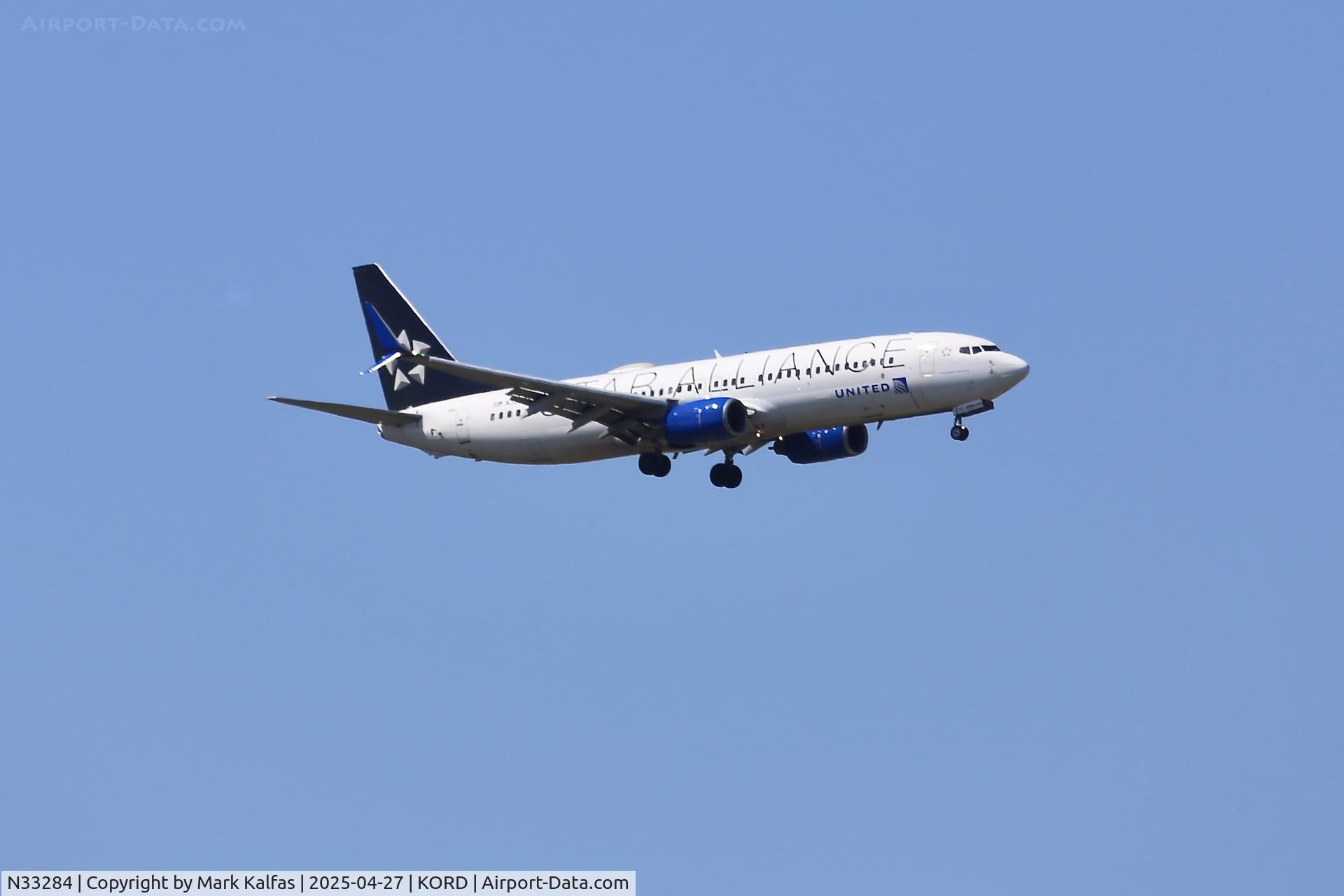 N33284, 2004 Boeing 737-824 C/N 31635, B738 United Airlines Boeing 737-824 N33284 on approach 10C KORD