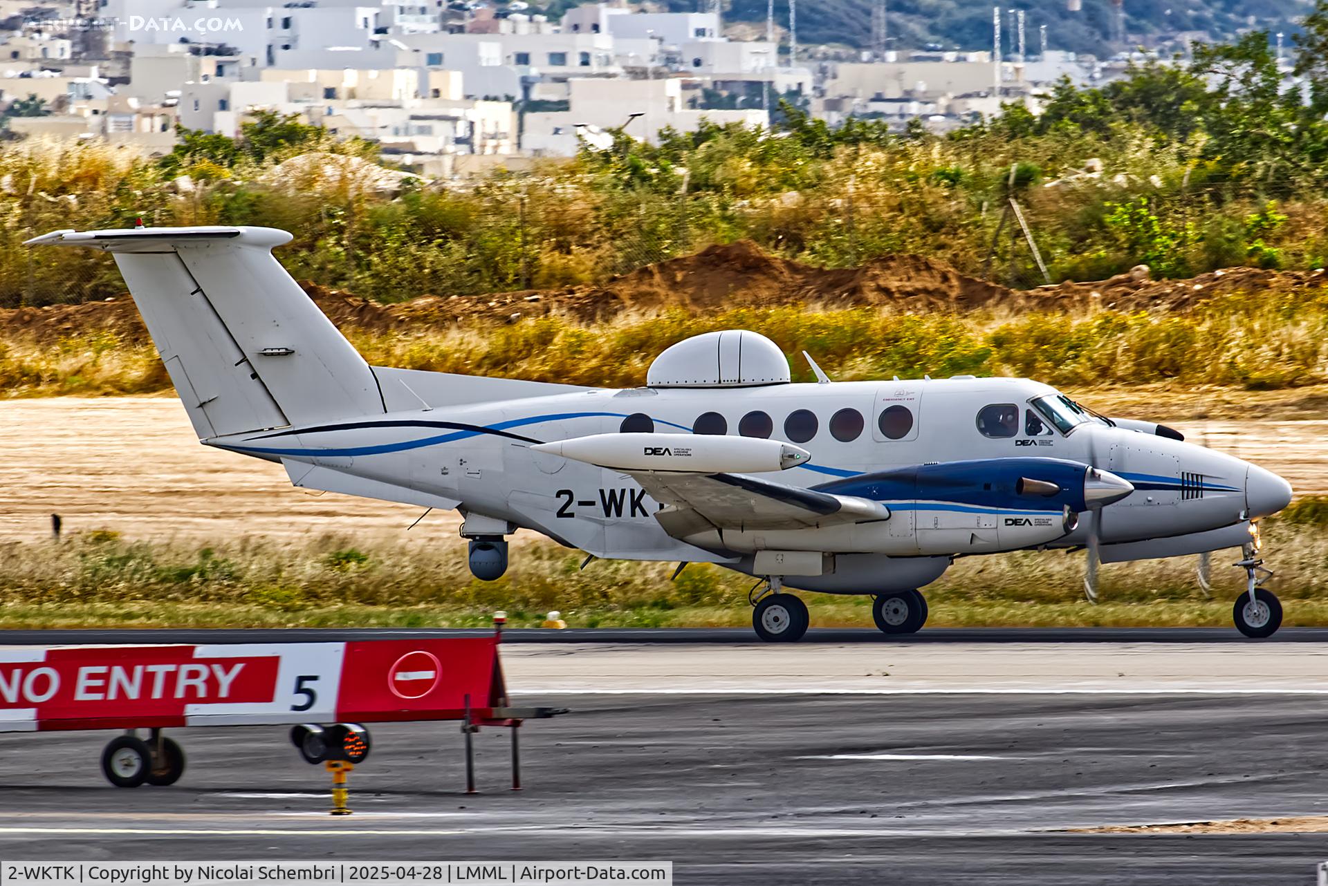 2-WKTK, 1985 Beech 200T Super King Air C/N BT-15, Backtracking runway 13 after landing.
