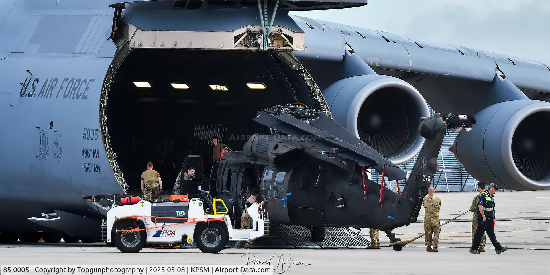 85-0005, 2011 Lockheed C-5M Super Galaxy C/N 500-0091, backing out a NH UH-60A Bloackhawk