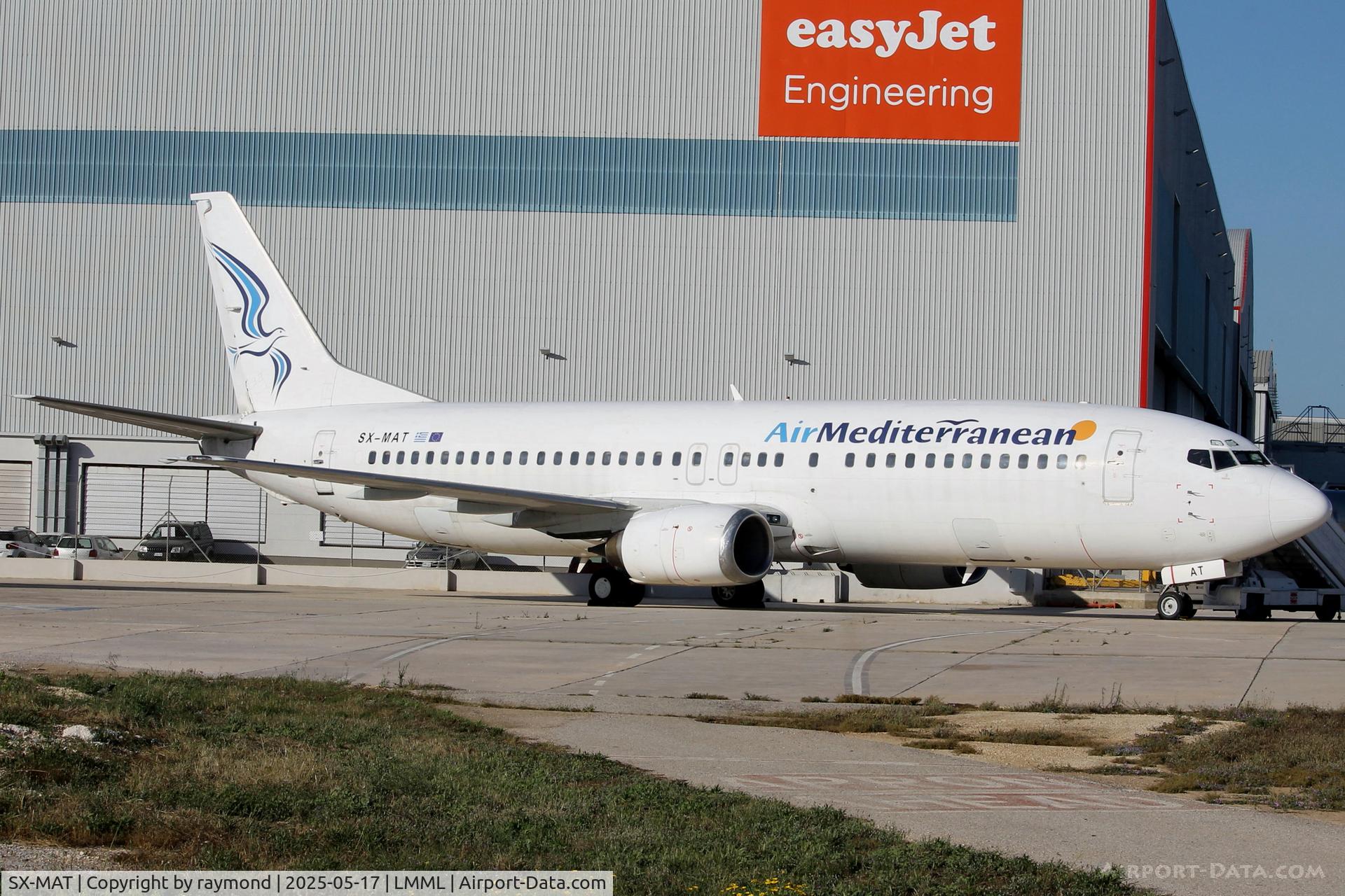 SX-MAT, 1997 Boeing 737-446 C/N 28831, Boeing737-400 reg SX-MAT of Air Mediterranean on Park No 4 at Malta.