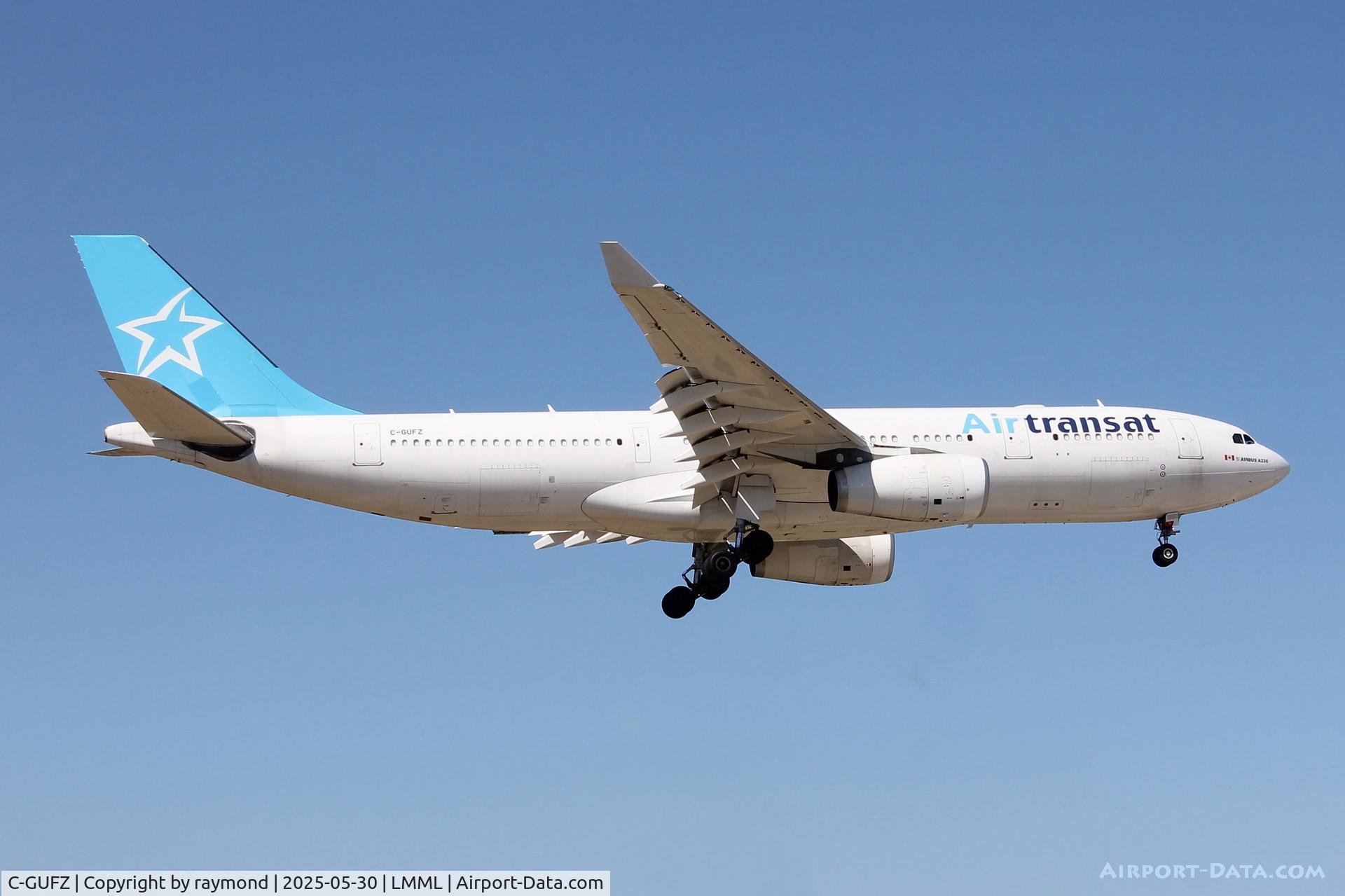 C-GUFZ, 2009 Airbus A330-243 C/N 1045, Airbus A330-243 reg C-GUFZ of Air Transat on final approach to RW31. Aircraft came for a repaint by Aircraft Cosmetics Malta.