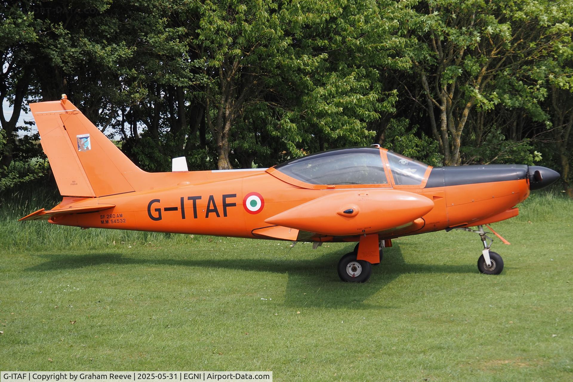 G-ITAF, 1983 SIAI-Marchetti SF-260AM C/N 40-013/690, Parked at Skegness.