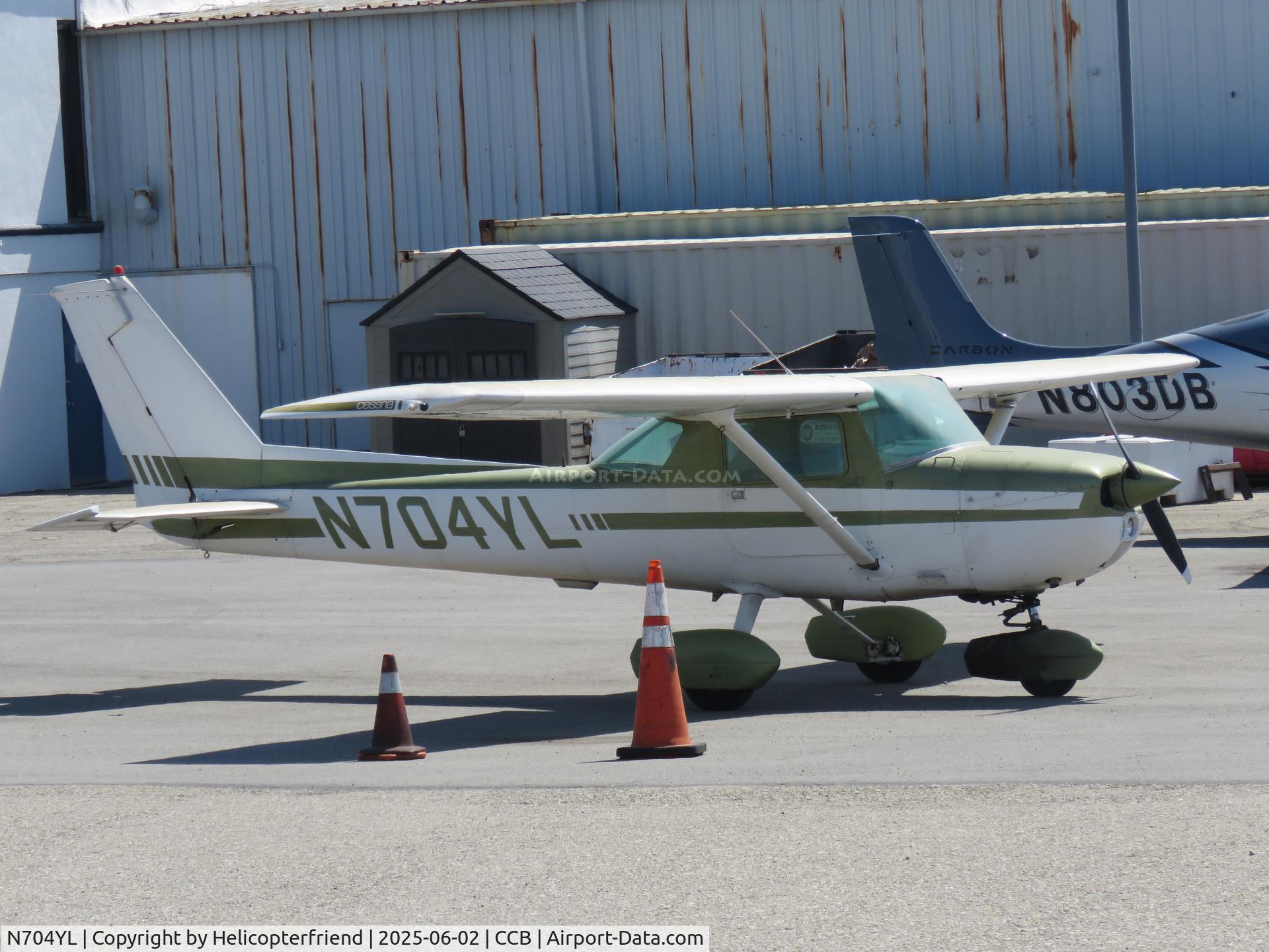 N704YL, 1976 Cessna 150M C/N 15078978, Parked near the garage area