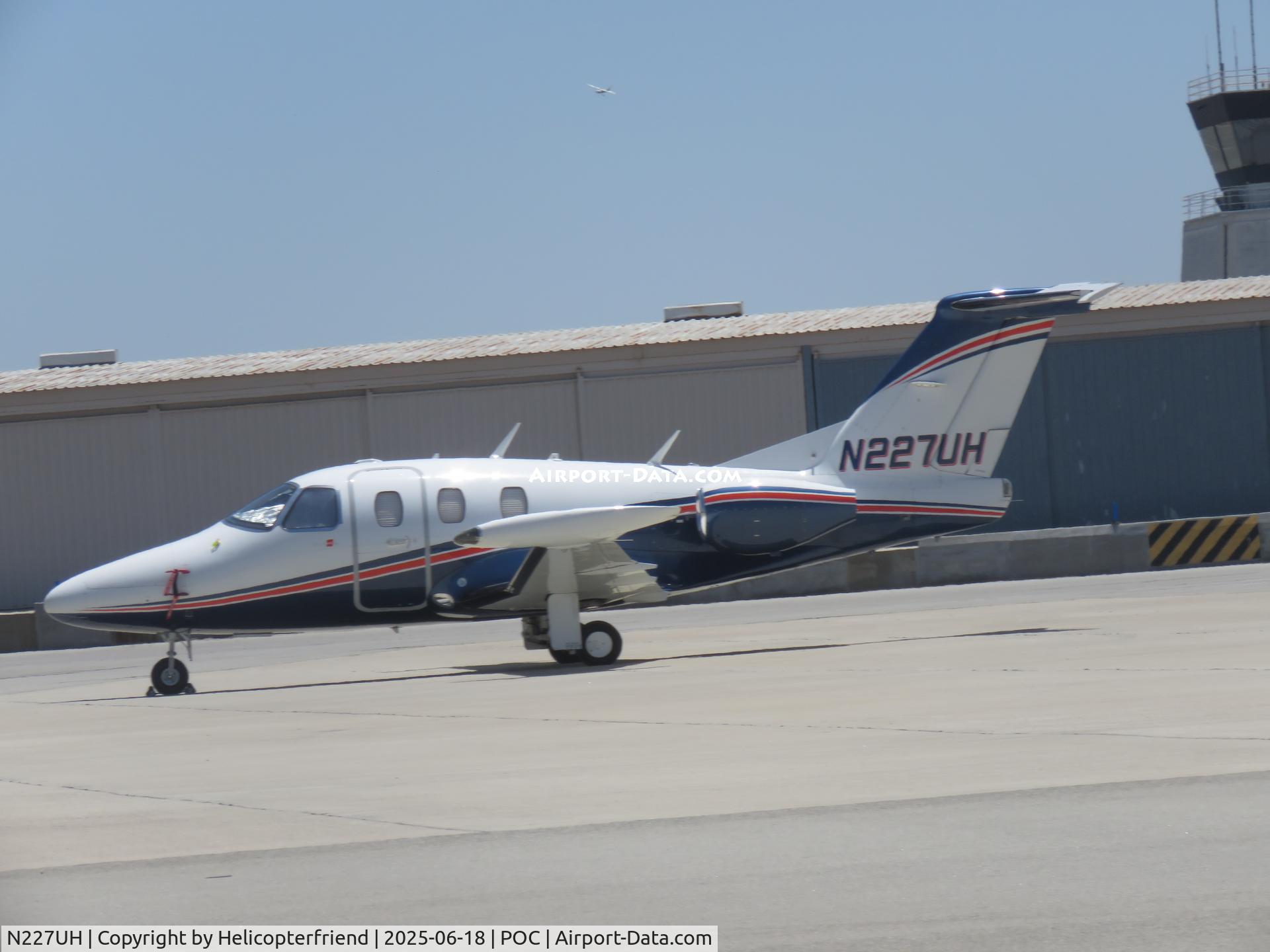 N227UH, 2008 Eclipse Aviation Corp EA500 C/N 000227, In north side transit parking