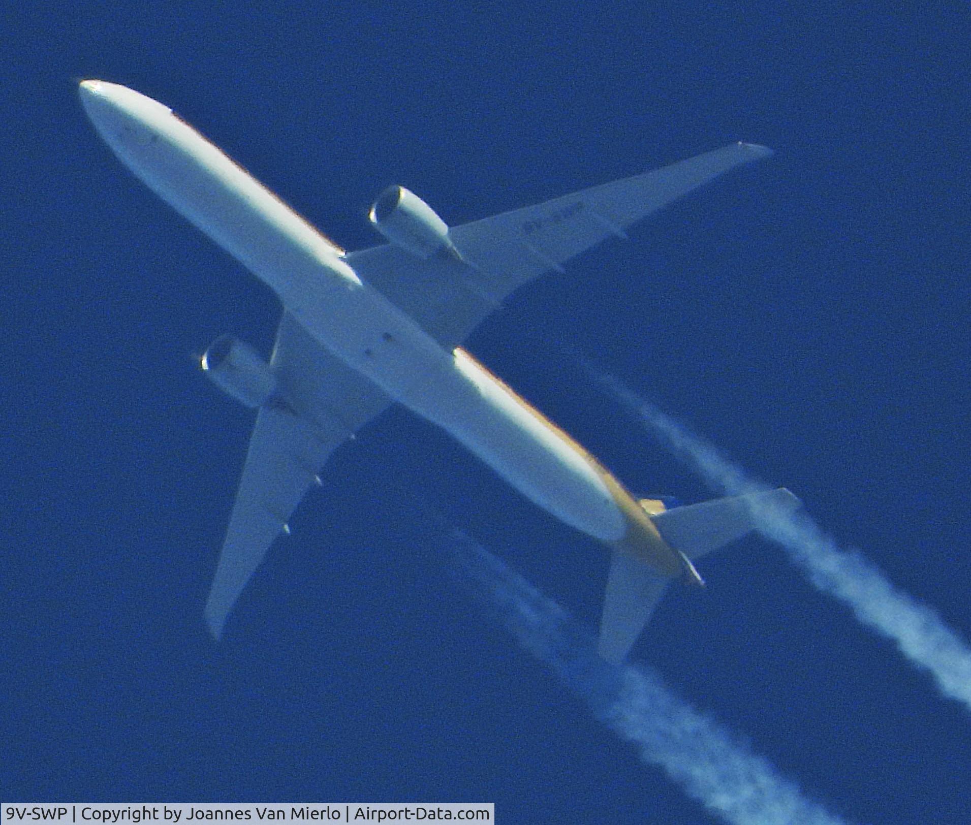 9V-SWP, 2008 Boeing 777-312/ER C/N 34581, Cruising over Belgium