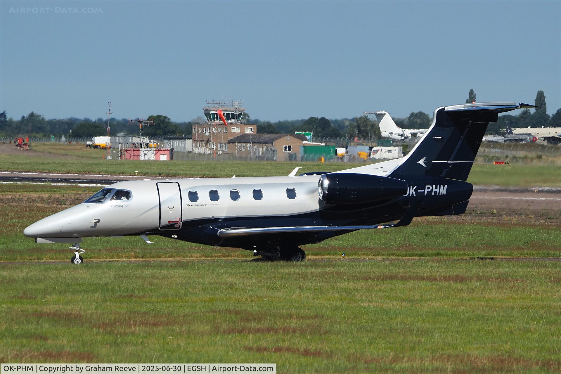 OK-PHM, 2018 Embraer EMB-505 Phenom 300 C/N 50500445, Just landed at Norwich.