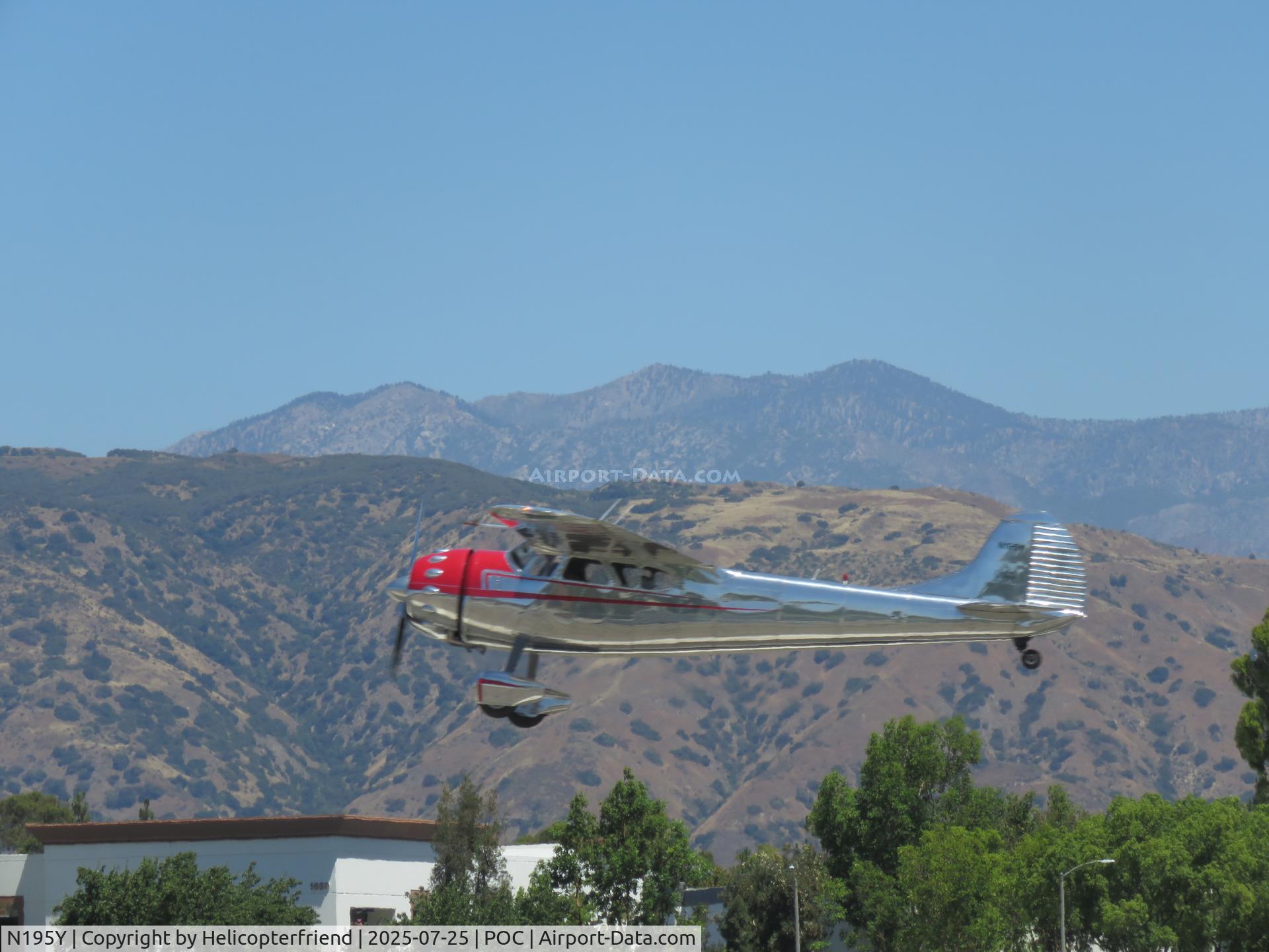 N195Y, 1951 Cessna 195 C/N 7629, Climbing out west bound