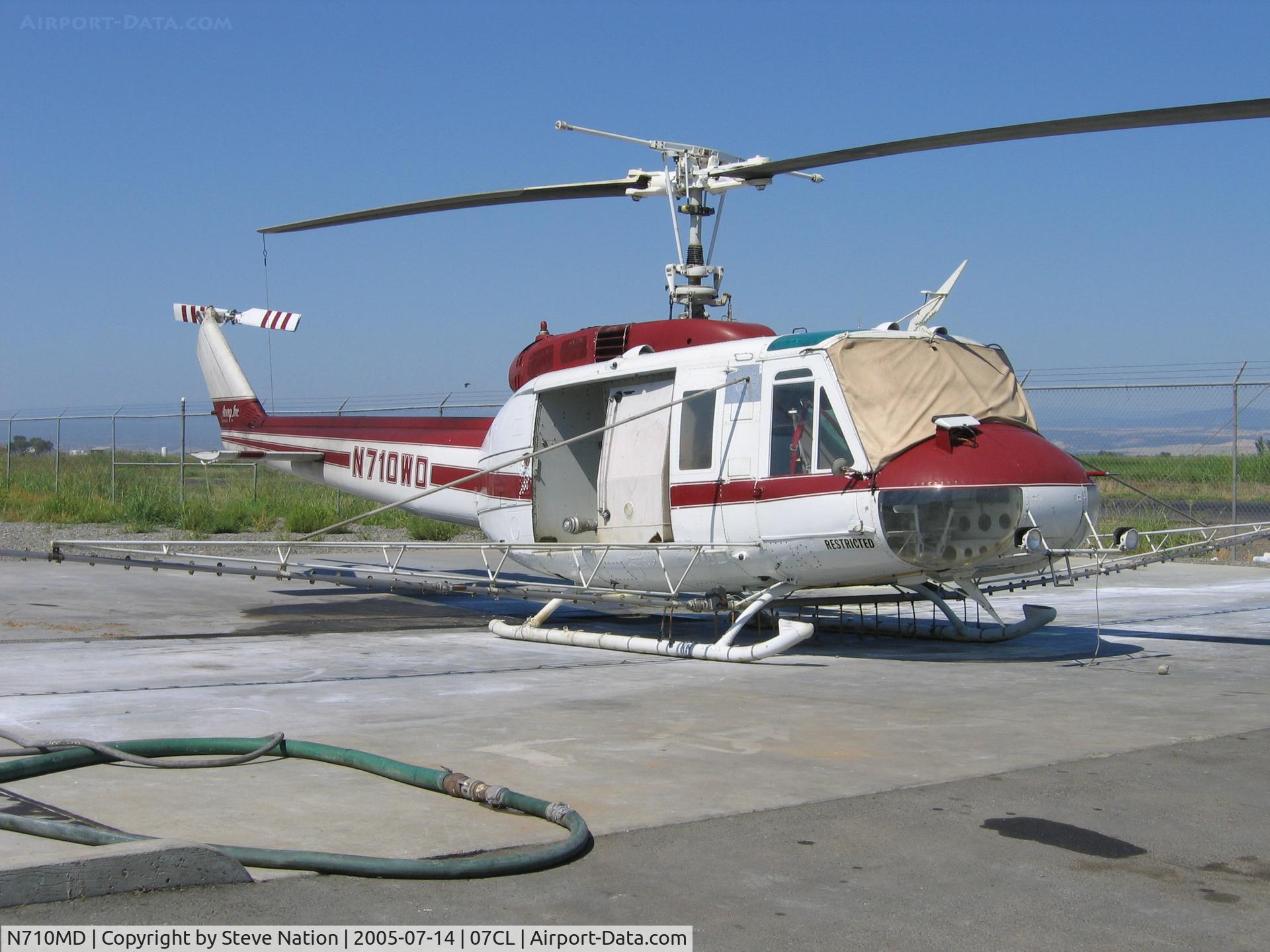 N710MD, 2001 Cirrus SR20 C/N 1126, Av Ag Inc. 1965 Williams Helicopter/Bell UH-1H (65-9761) rigged as sprayer at their Richvale, CA base