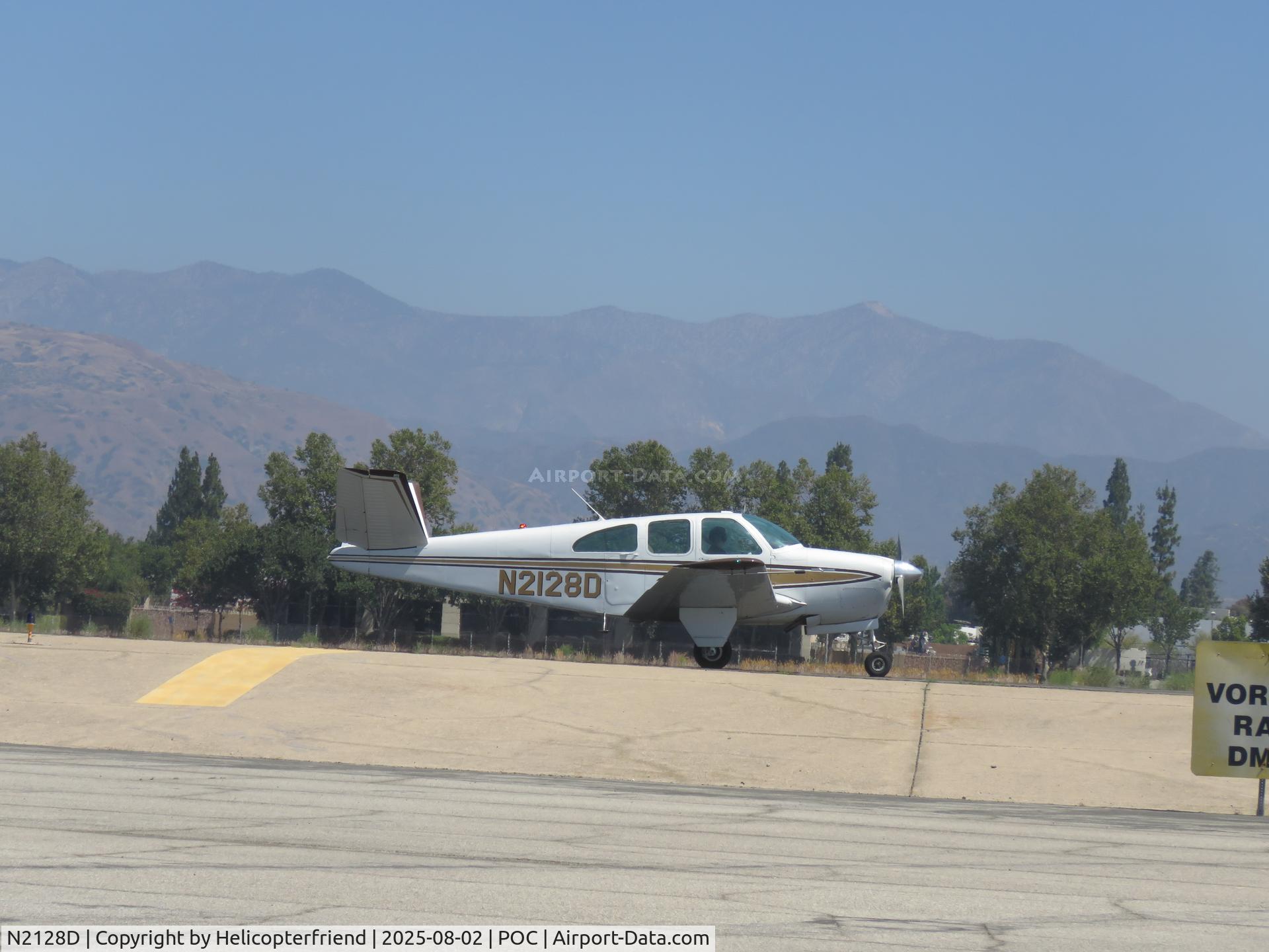 N2128D, 1960 Beech D35 C/N D-3473, Taxiing to runway 26L
