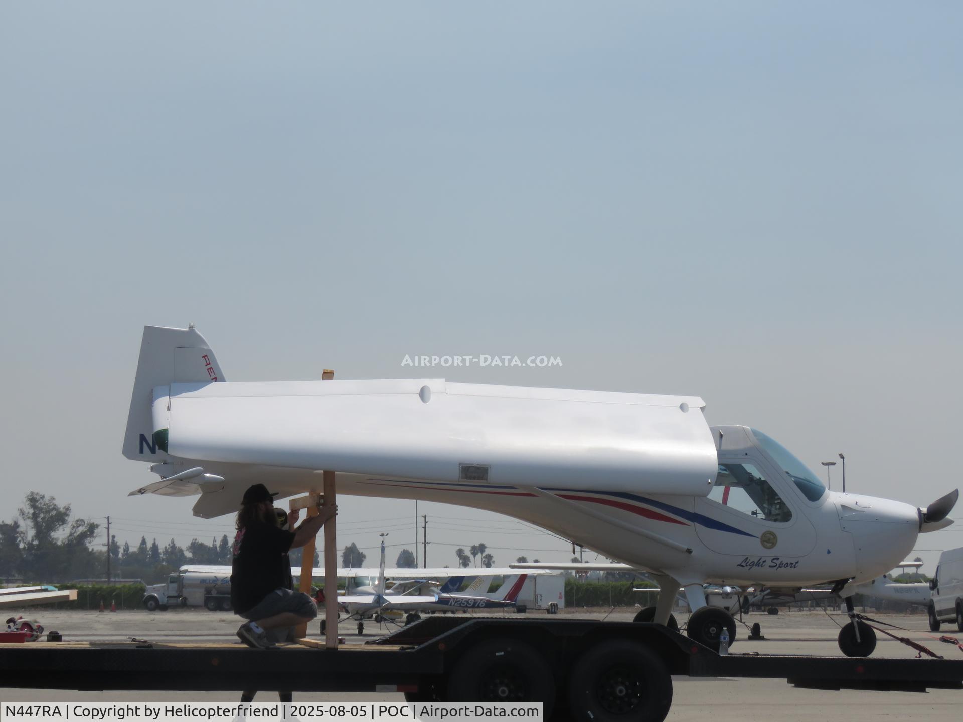 N447RA, 2008 Remos GX C/N 256, Wings being folded to stay within limits