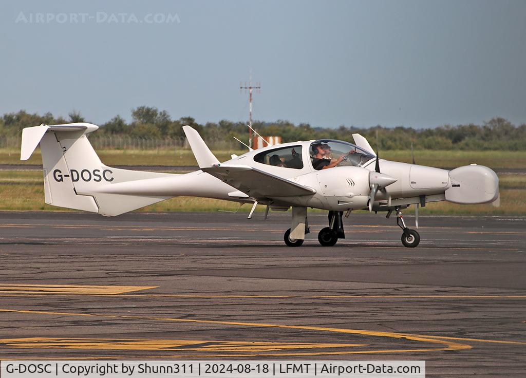 G-DOSC, Diamond DA-42M Twin Star C/N 42M.001, Taxxing to the General Aviation area...
