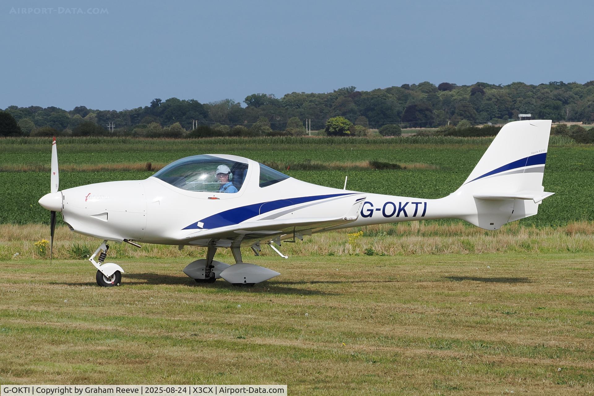 G-OKTI, 2007 Aquila A210 (AT01) C/N AT01-172, Just landed at Northrepps.