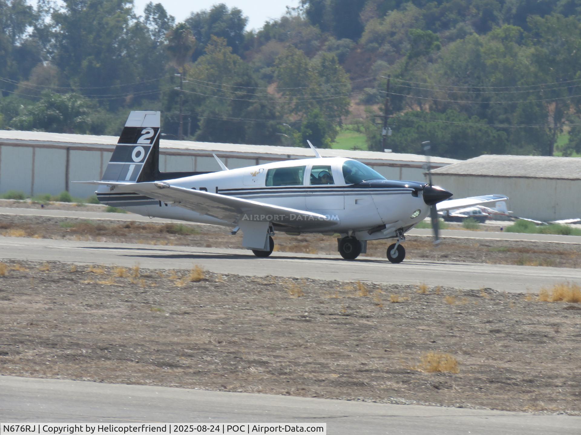 N676RJ, 1982 Mooney M20J 201 C/N 24-1323, Rolling out on runway 36R
