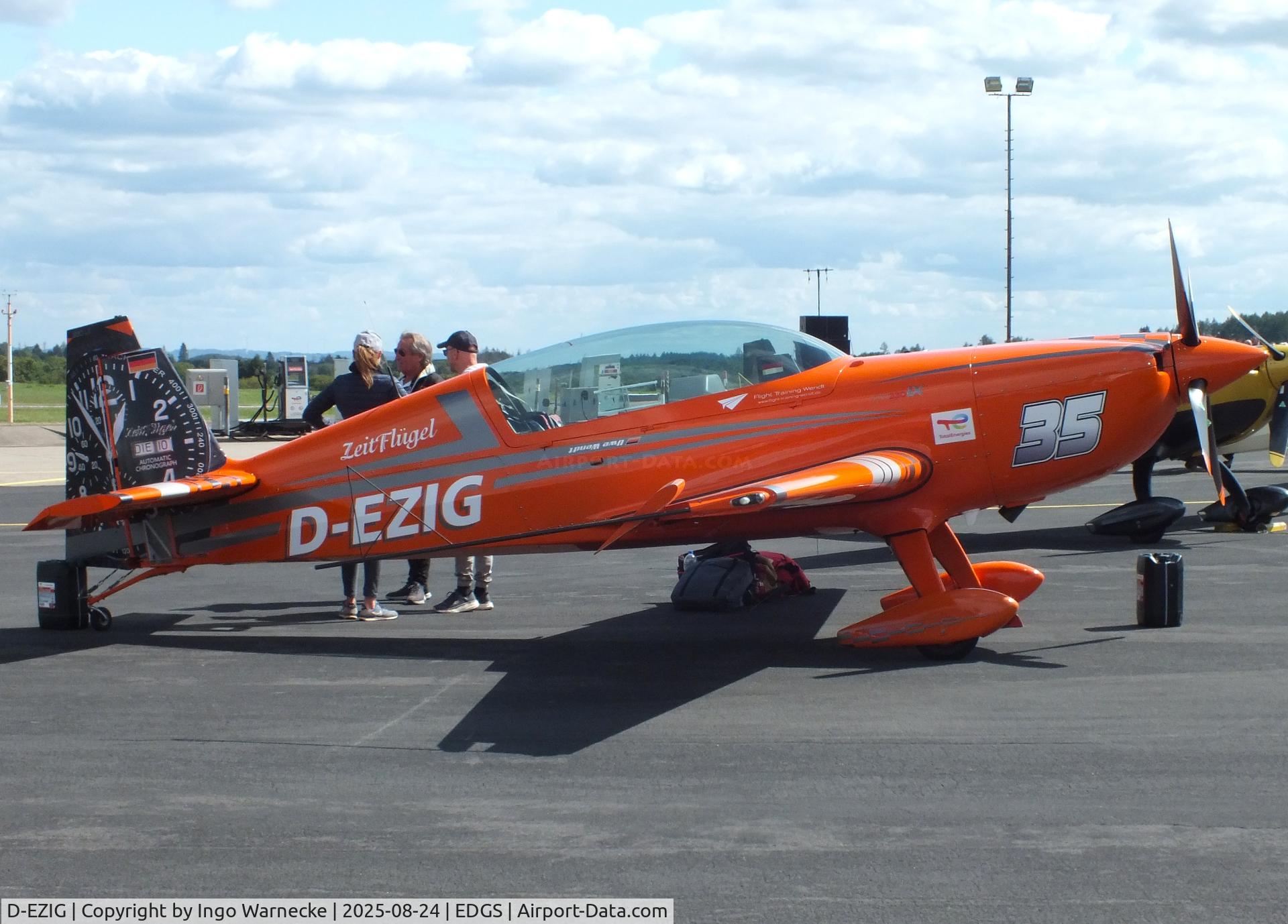 D-EZIG, Extra EA-300LC C/N LC030, Extra EA-330LX at the 2025 Flughafenfest (airport open day) at Siegerlandflughafen (Siegerland airport), Burbach