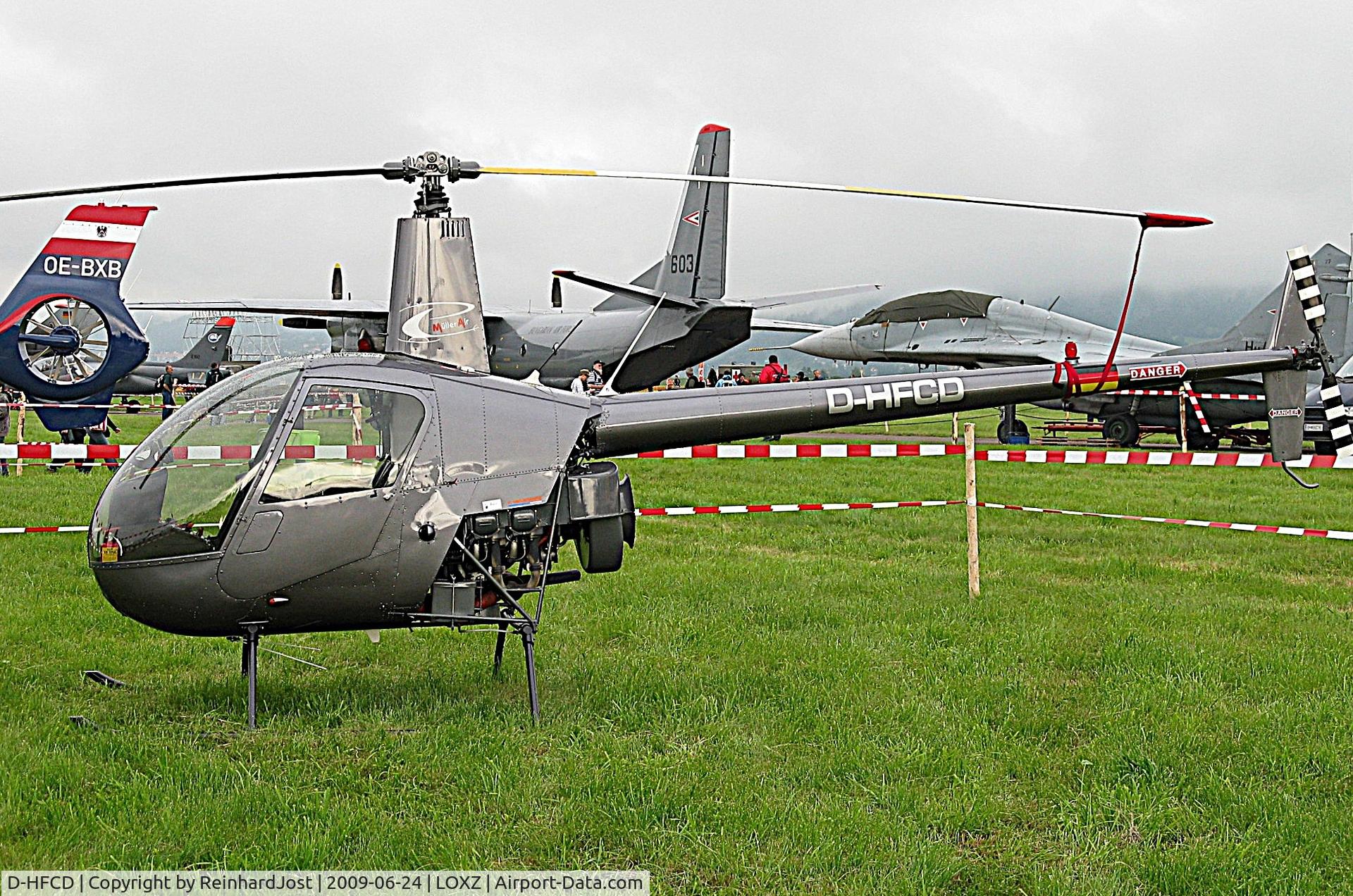 D-HFCD, 2004 Robinson R22 Beta II C/N 3634, 2004-build Beta II with Mueller Air titles at Airpower 2009, Zeltweg (LOXZ), Austria
