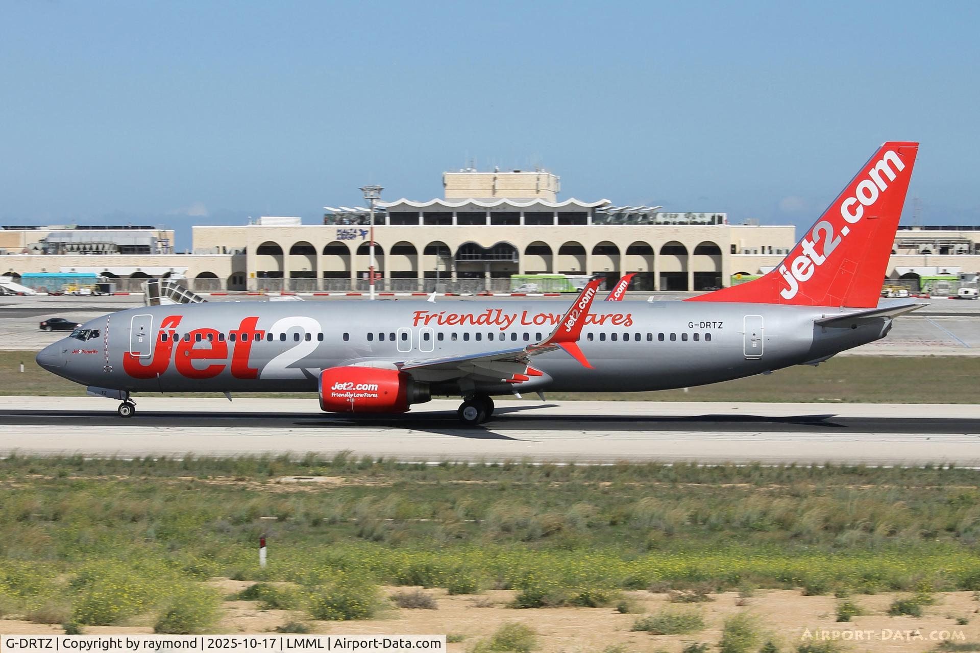 G-DRTZ, 2004 Boeing 737-8AS C/N 33557, Boeing 737-8AS reg G-DRTZ of Jet2Com rolling RW31 departing from Malta. G-DRTZ, 2004 Boeing 737-8AS C/N 33557, Boeing 737-8AS reg G-DRTZ of Jet2Com rolling RW31 departing from Malta.