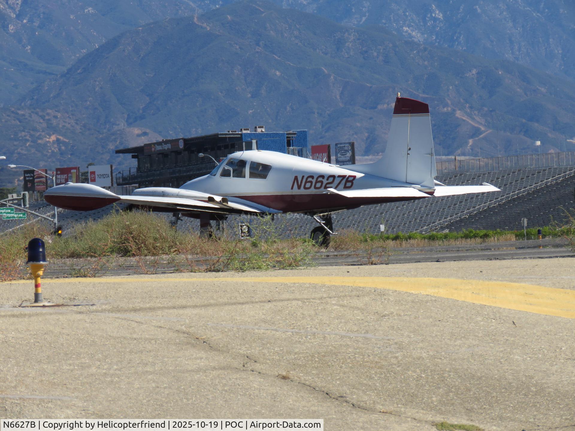 N6627B, 1958 Cessna 310B C/N 35727, Holding short of runway 26L N6627B, 1958 Cessna 310B C/N 35727, Holding short of runway 26L