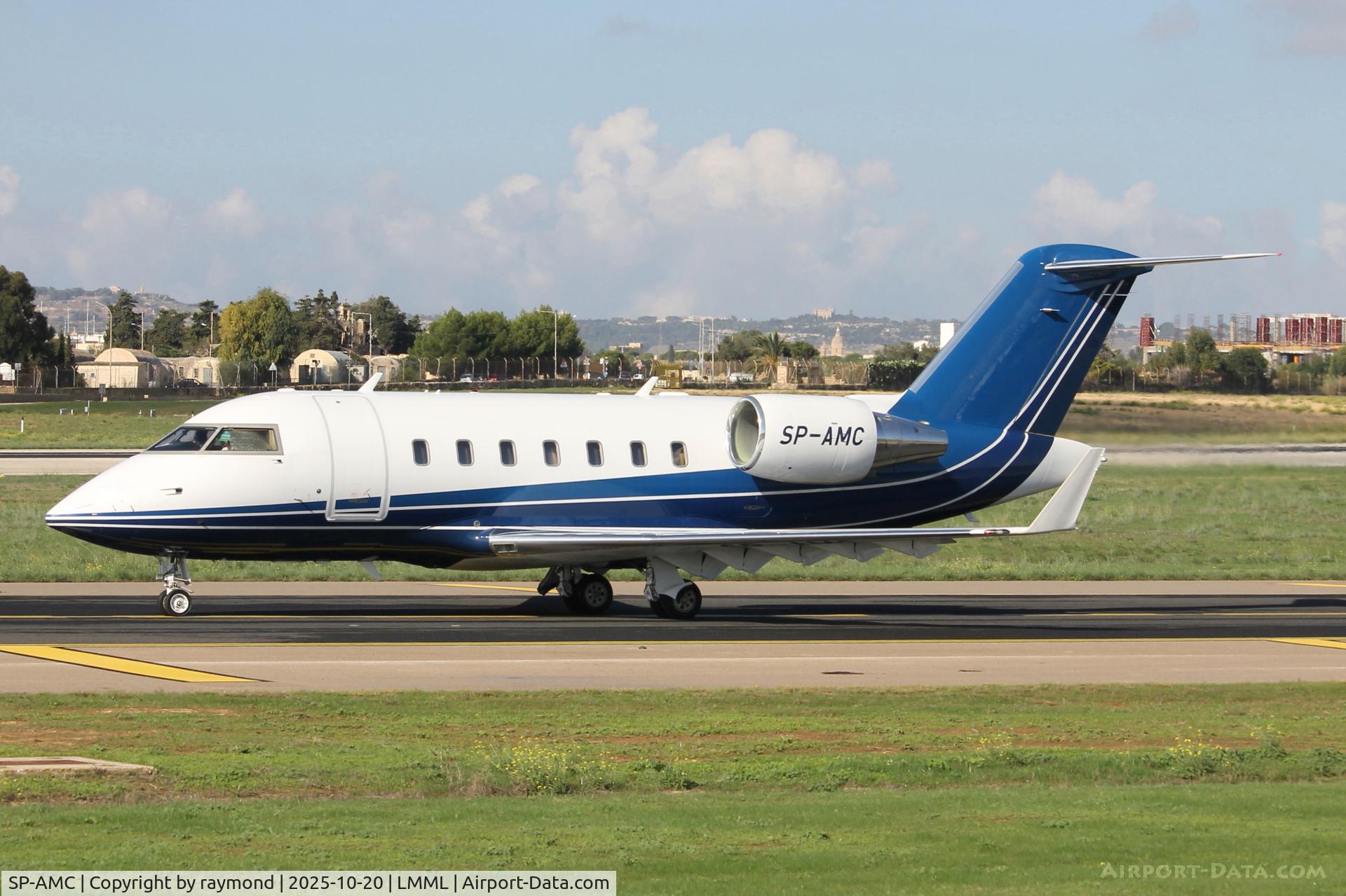 SP-AMC, Bombardier Challenger 605 C/N 5785, Bombardier Challenger 605 reg SP-AMC of AMC Aviation taxiing out for departure from Malta. SP-AMC, Bombardier Challenger 605 C/N 5785, Bombardier Challenger 605 reg SP-AMC of AMC Aviation taxiing out for departure from Malta.