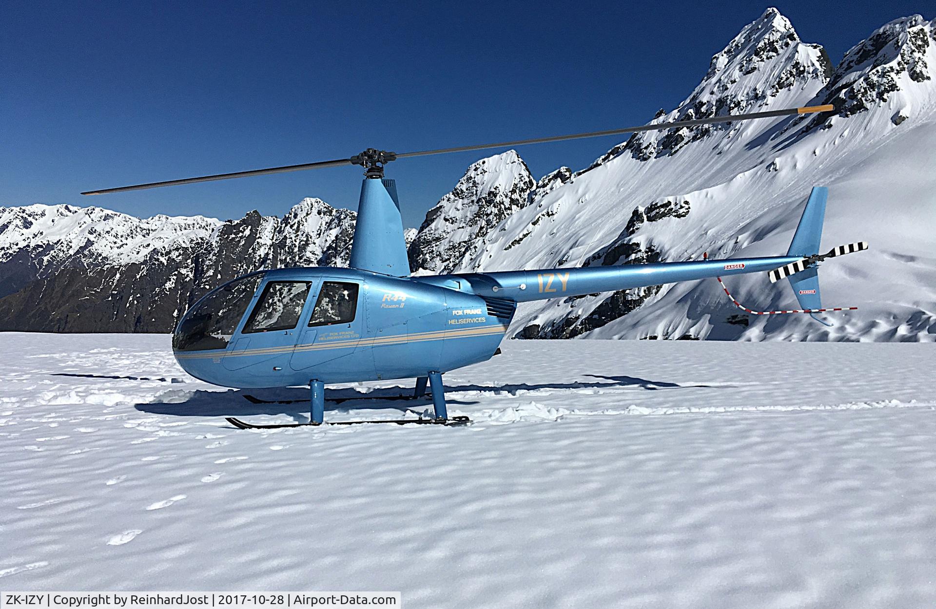 ZK-IZY, Robinson R44  Raven II C/N 12977, On a snowfield stop in the Westland Tai Portini National Park, South Island, New Zealand, during a sightseeing flight over the Fox and Franz Josef Glaciers