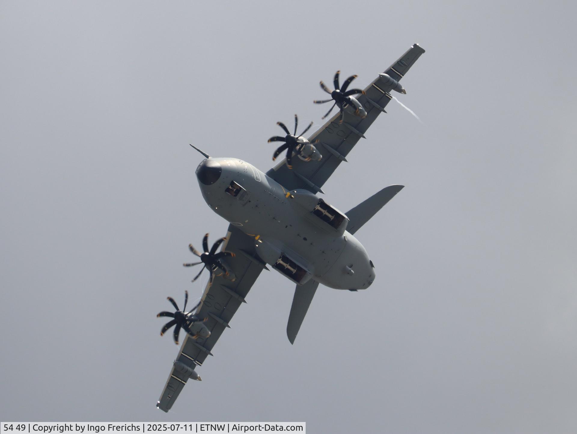 54 49, 2024 Airbus A400M-180 C/N 143, A400M-180 54 49 flies over Wunstorf Air Base (ETNW), undercarriage open. 54 49, 2024 Airbus A400M-180 C/N 143, A400M-180 54 49 flies over Wunstorf Air Base (ETNW), undercarriage open.