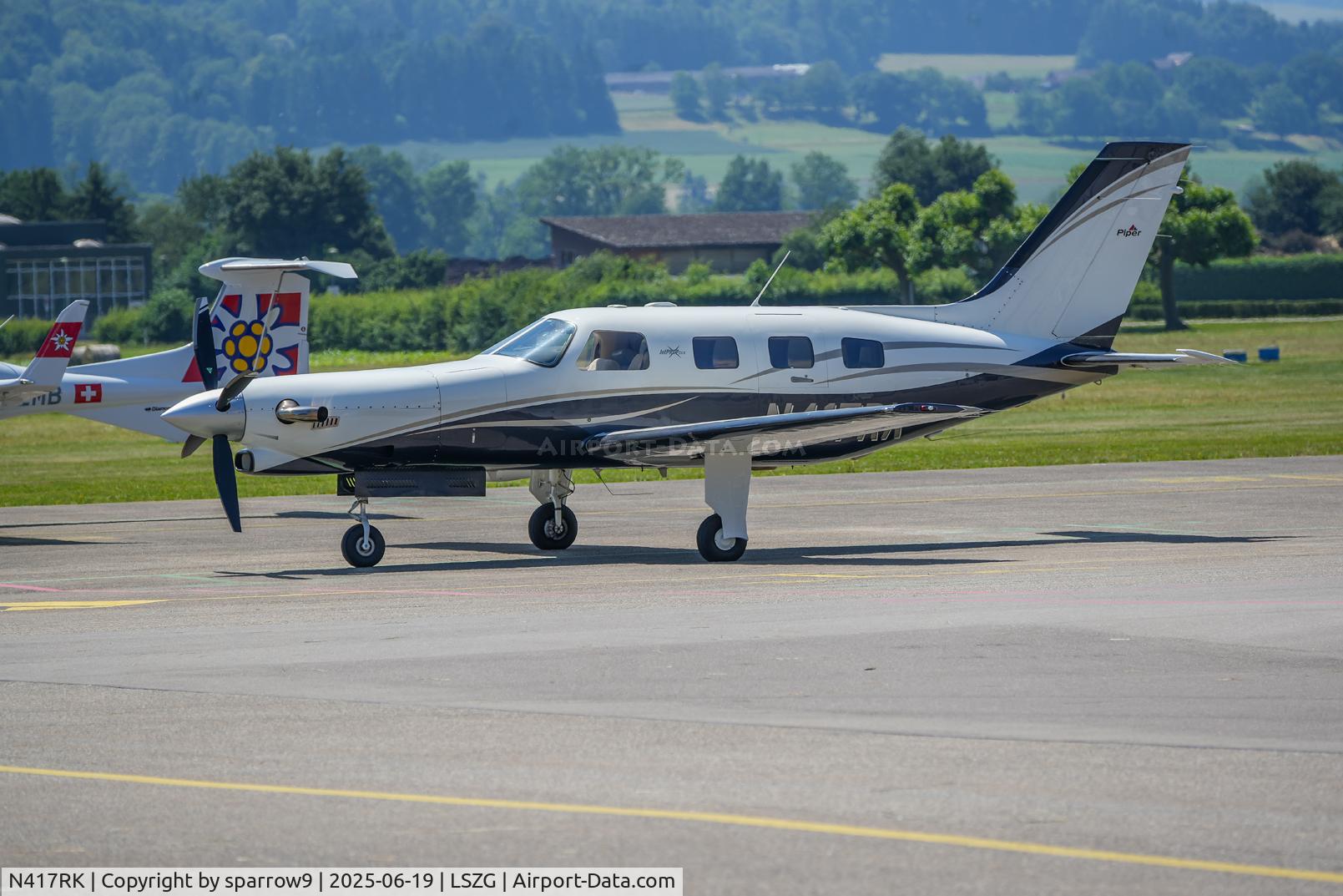 N417RK, 1999 Piper PA-46-350P Malibu Mirage C/N 4636249, Parked at Grenchen