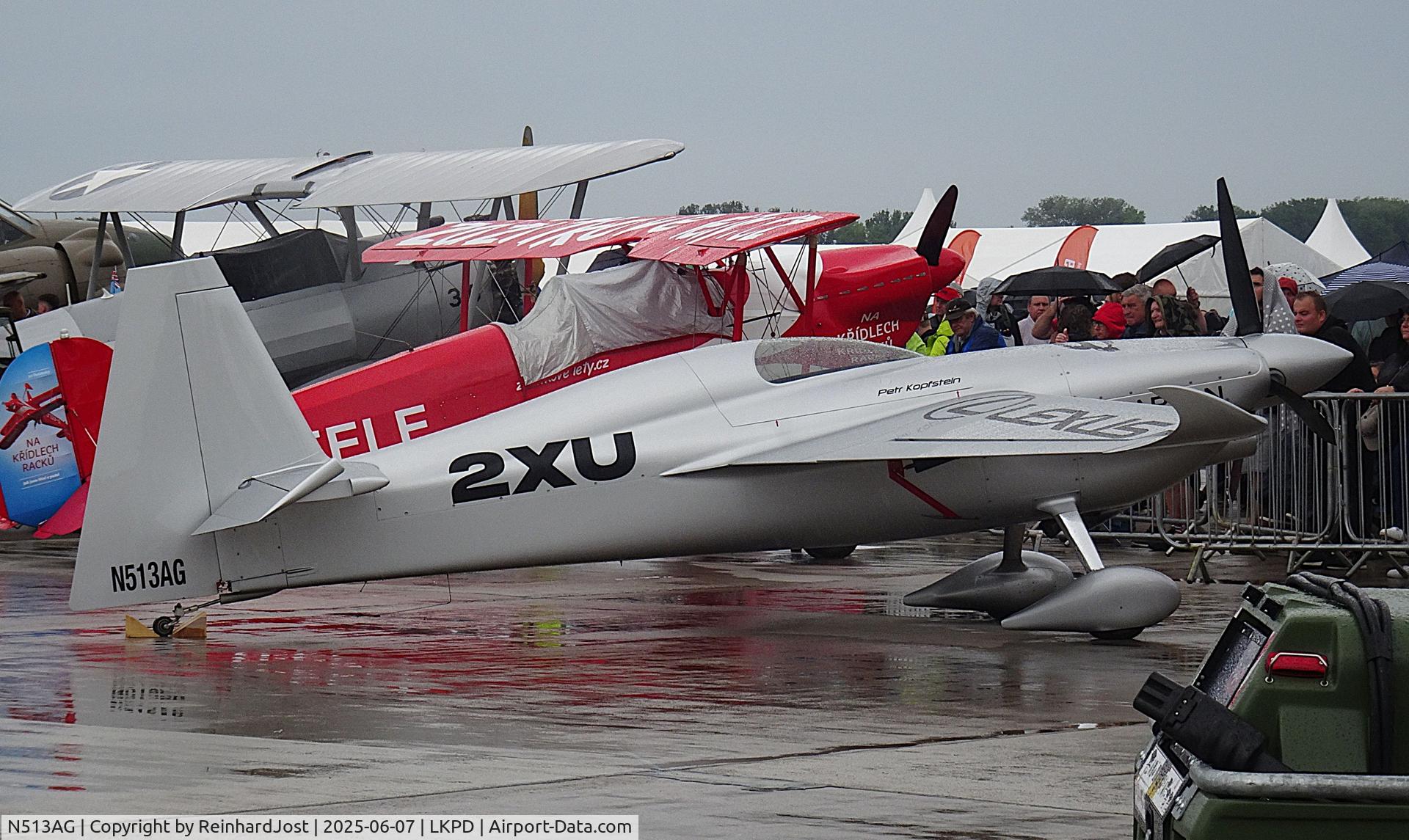 N513AG, Zivko Edge 540 C/N 0050V3, Modified Edge 540, flown by Petr Kopfstein, in the rain at Pardubice Airshow, Czech Republic