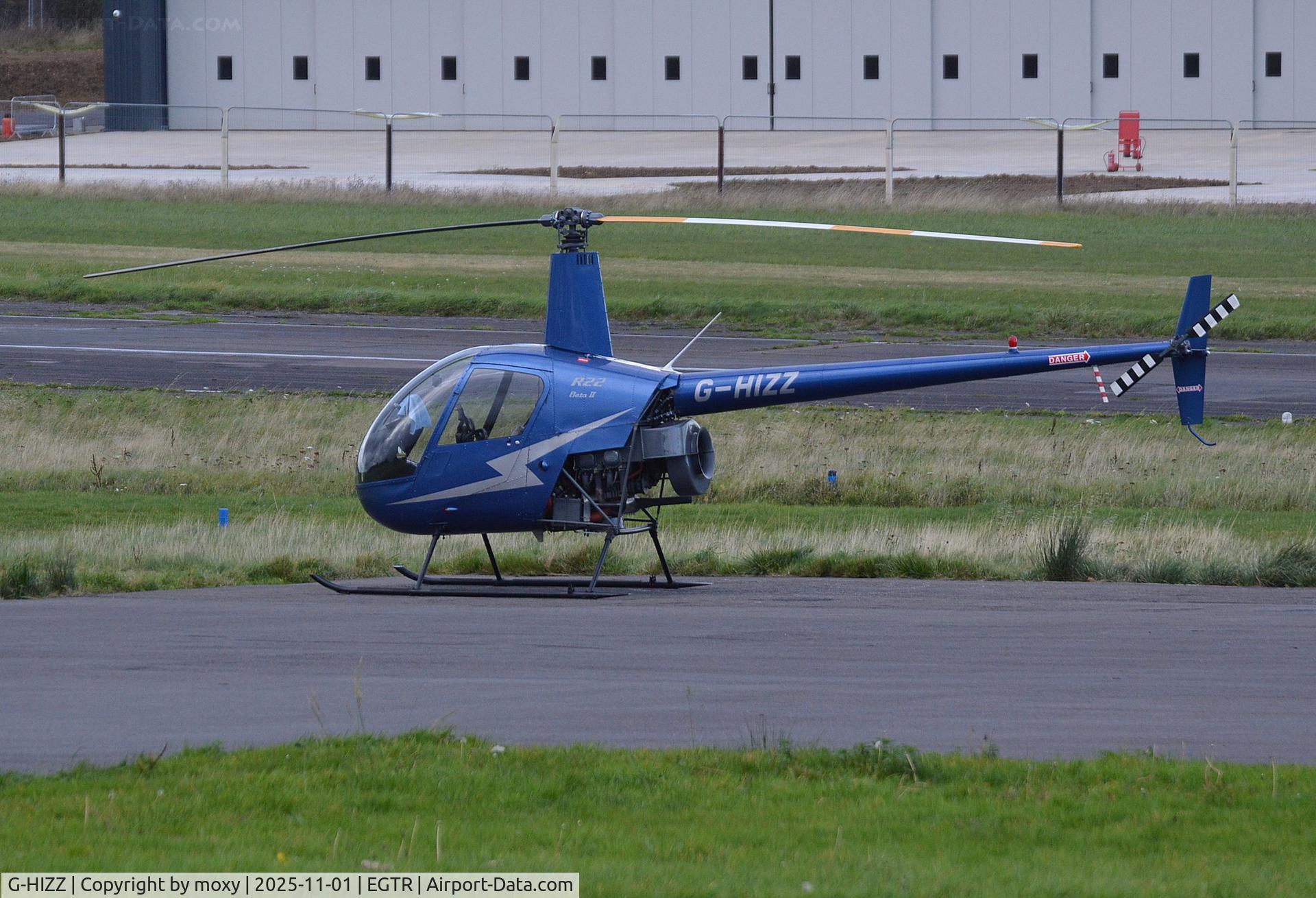 G-HIZZ, 1997 Robinson R22 Beta C/N 2677, Robinson R22 Beta at Elstree. 