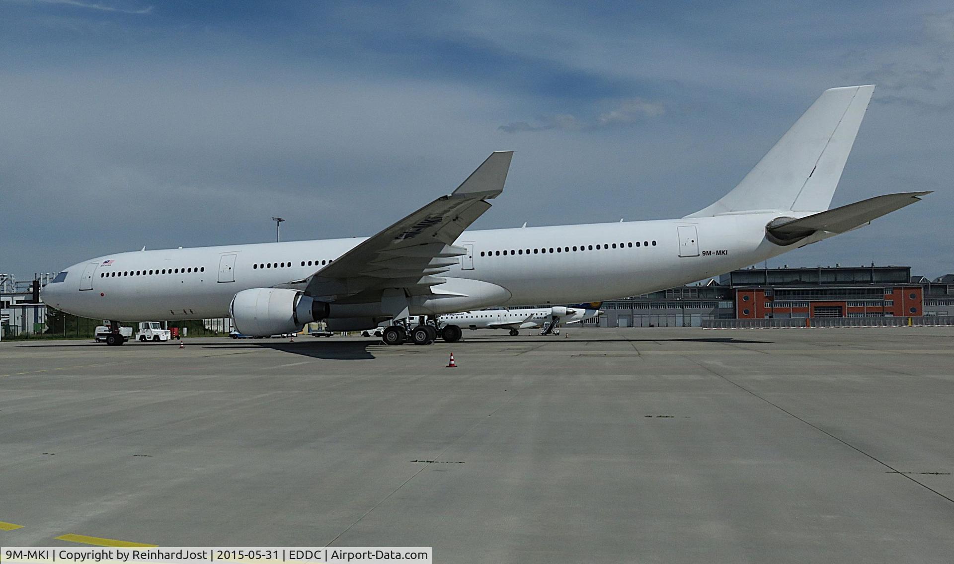 9M-MKI, 1995 Airbus A330-322 C/N 116, 9M-MKI all-white at  Dresden (EDDC), Germany, awaiting its conversion into a freighter at Elbe Flugzeugwerke. It later became G-CIOH / D-AAEA / EI-HEA / B-LDO.