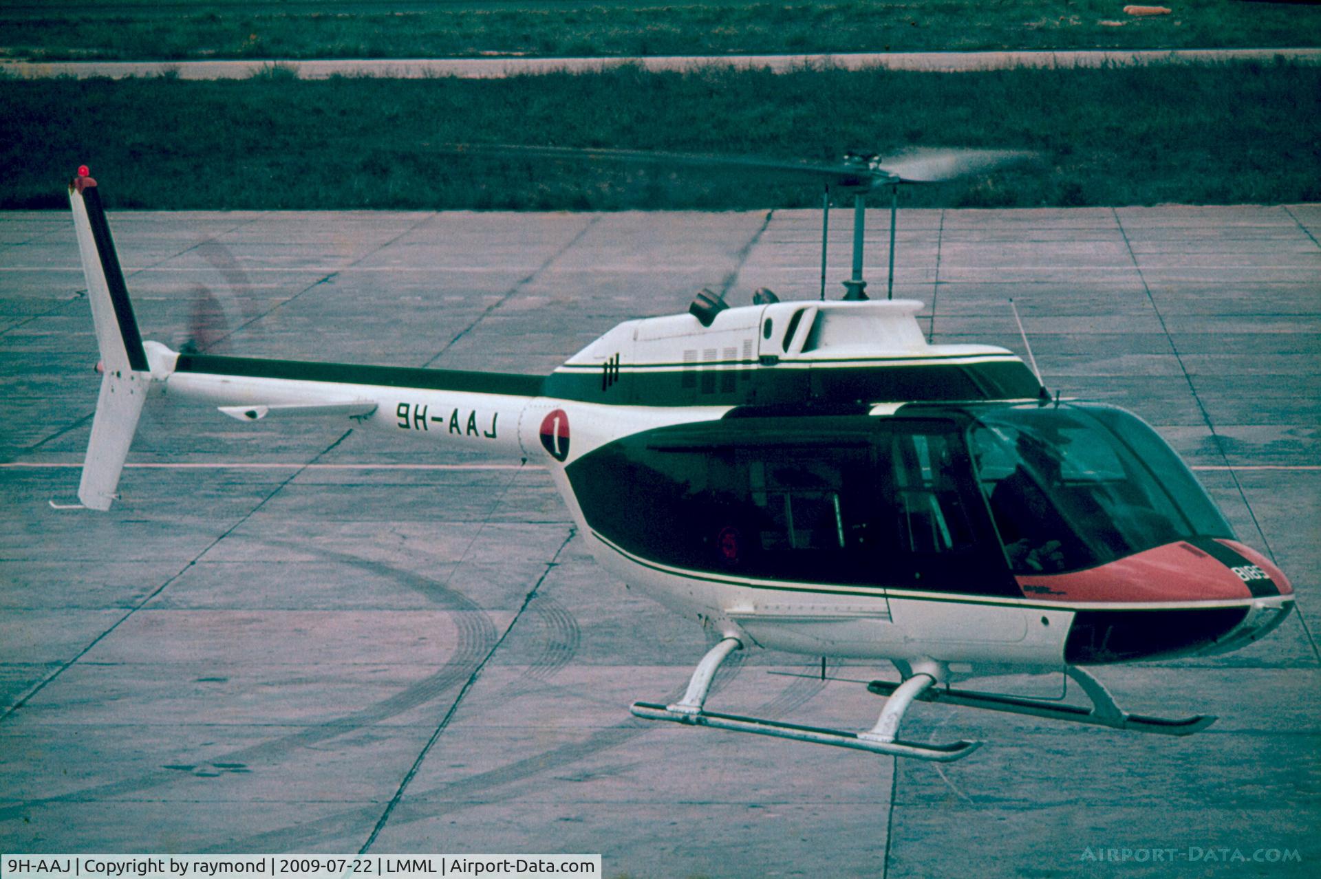 9H-AAJ, 1970 Agusta AB-206A JetRanger C/N 8185, Agusta AB-206B JetRanger II reg 9H-AAJ of 1 Regiment Armed Forces of Malta lifting off from Park No 8 at Malta way back in 1979.