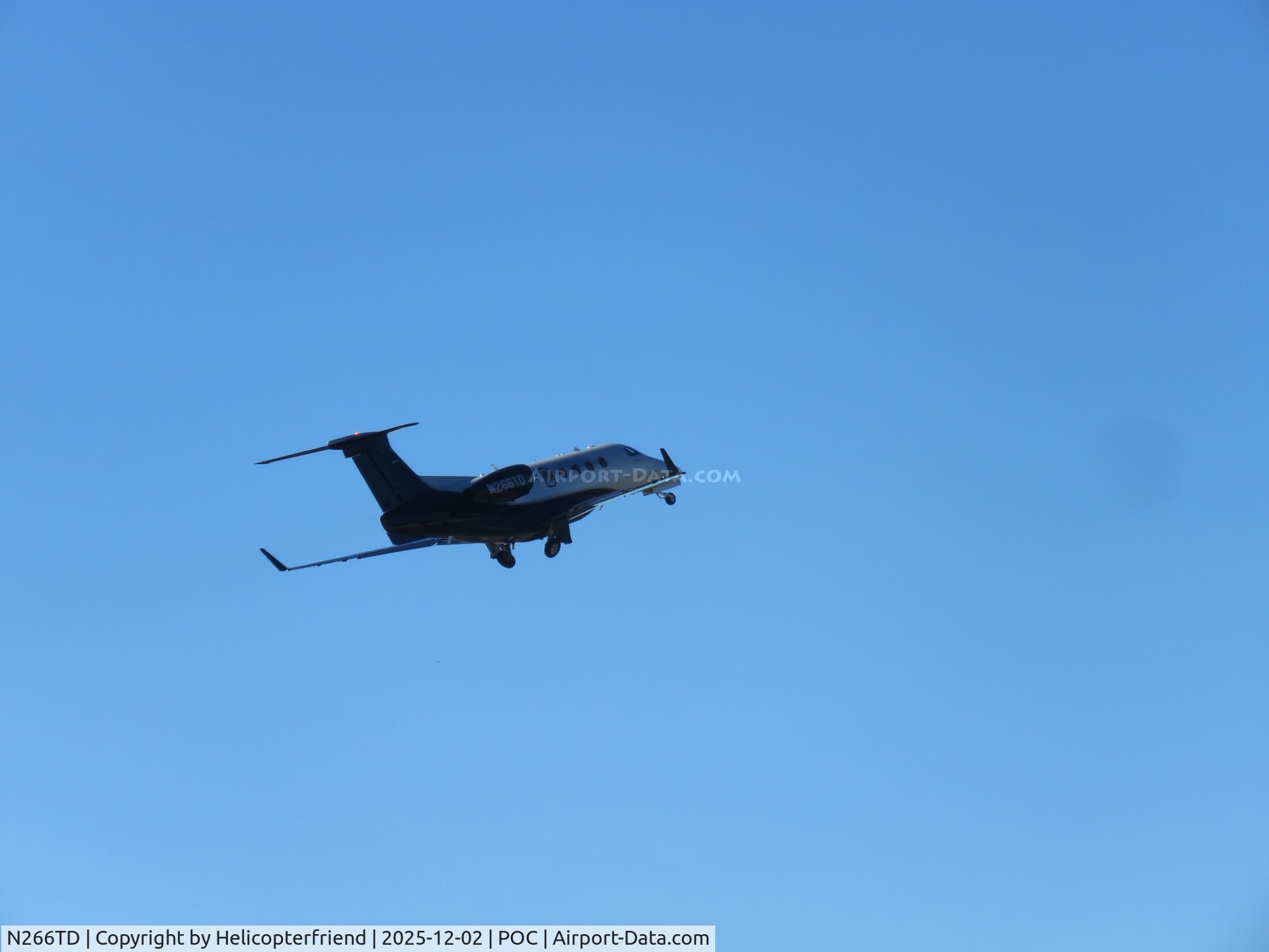 N266TD, 2015 Embraer EMB-505 Phenom 300 C/N 50500266, Landing gear retracting and westbound