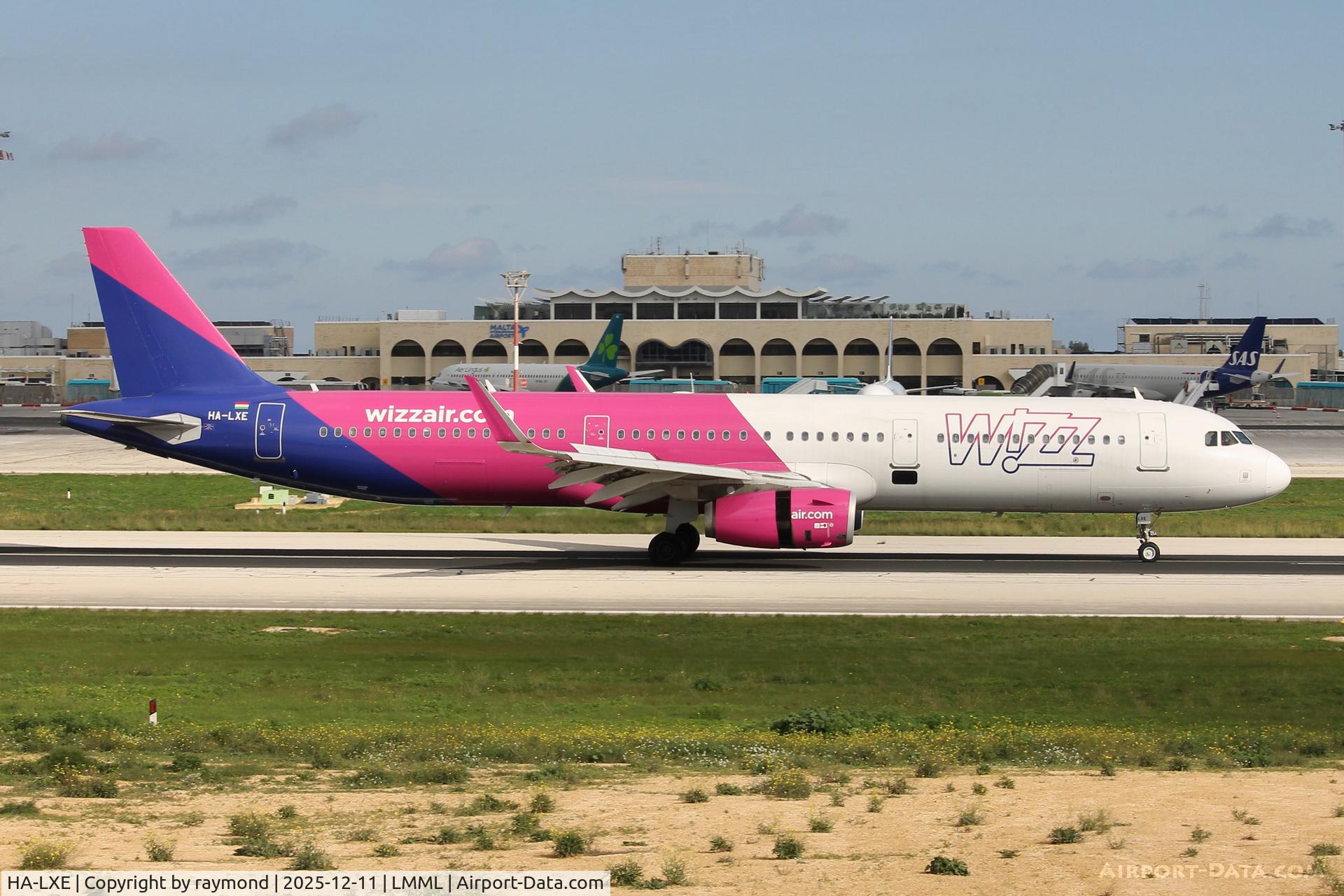 HA-LXE, 2016 Airbus A321-231 C/N 7114, Wizzair Airbus A321-231 reg HA-LXE on the main runway in Malta after landing on RW13.