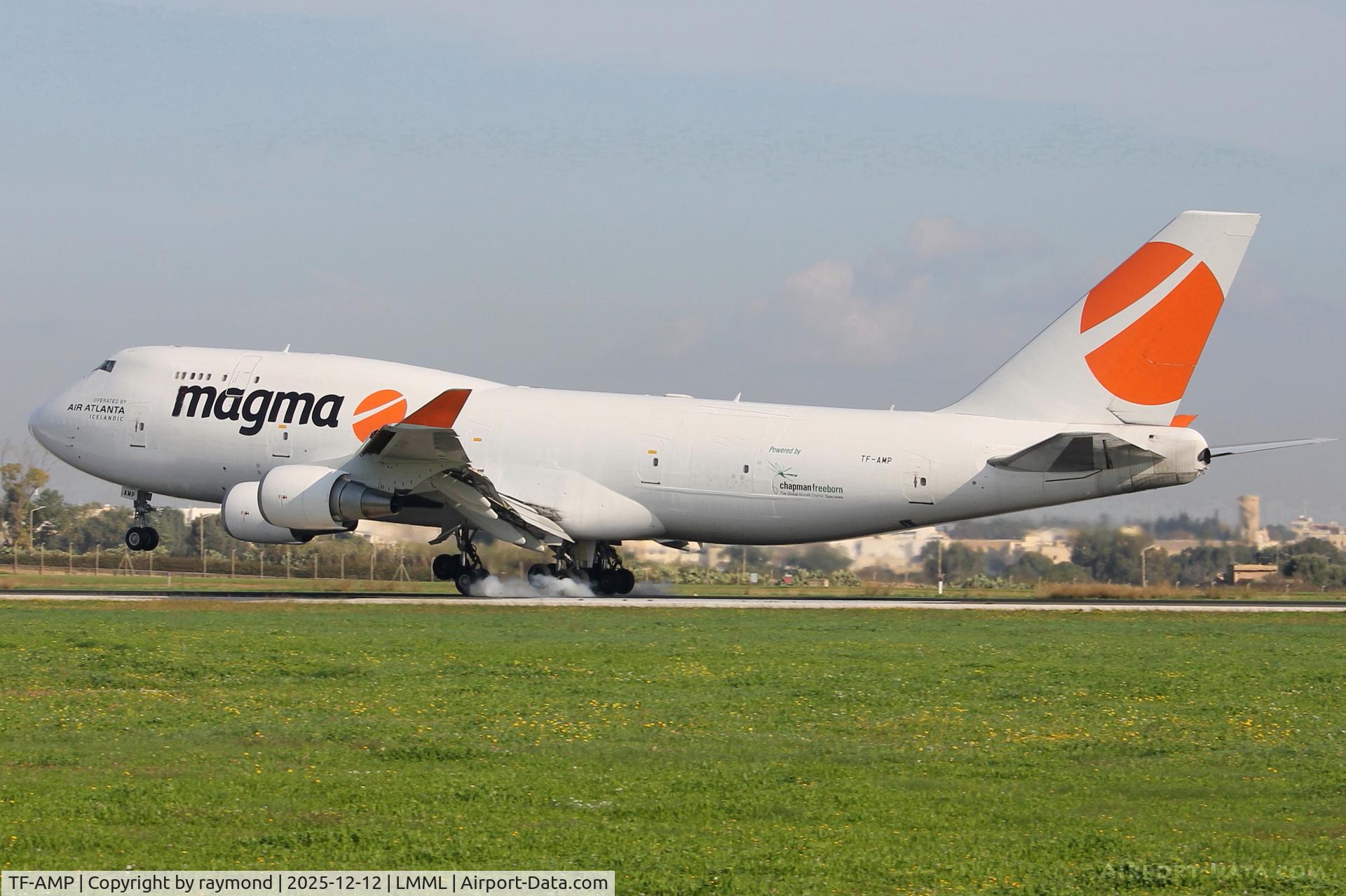 TF-AMP, 1990 Boeing 747-481/BCF C/N 24801, Boeing 747-481/BCF of Magma Aviation burning it's rubber on RW31 landing in Malta from Liege.