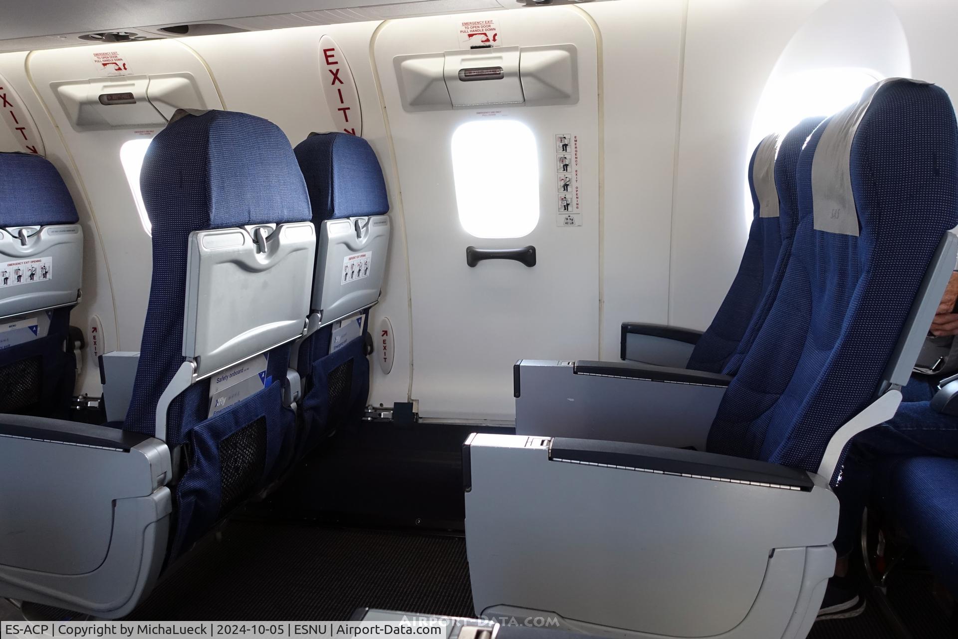 ES-ACP, 2009 Canadair CRJ-900ER (CL-600-2D24) C/N 15242, Plenty of legroom at the emergency exit