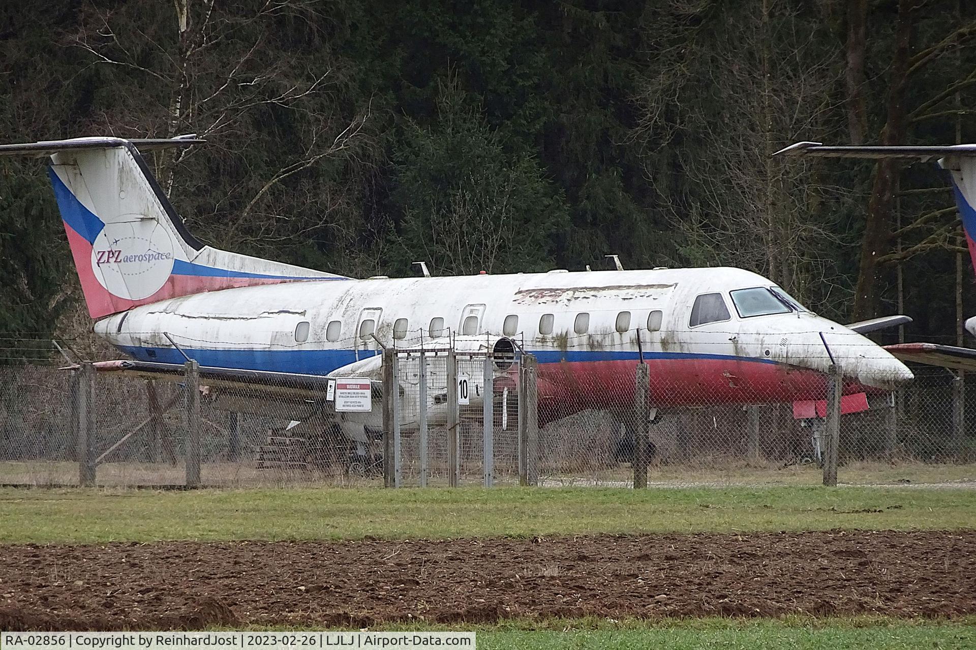RA-02856, 1991 Embraer EMB-120RT Brasilia Brasilia C/N 120240, Brasilia RA-02856 (ex N203SW) with ZPZ Aerospace titles derelict at Ljubljana Airport, Slovenia