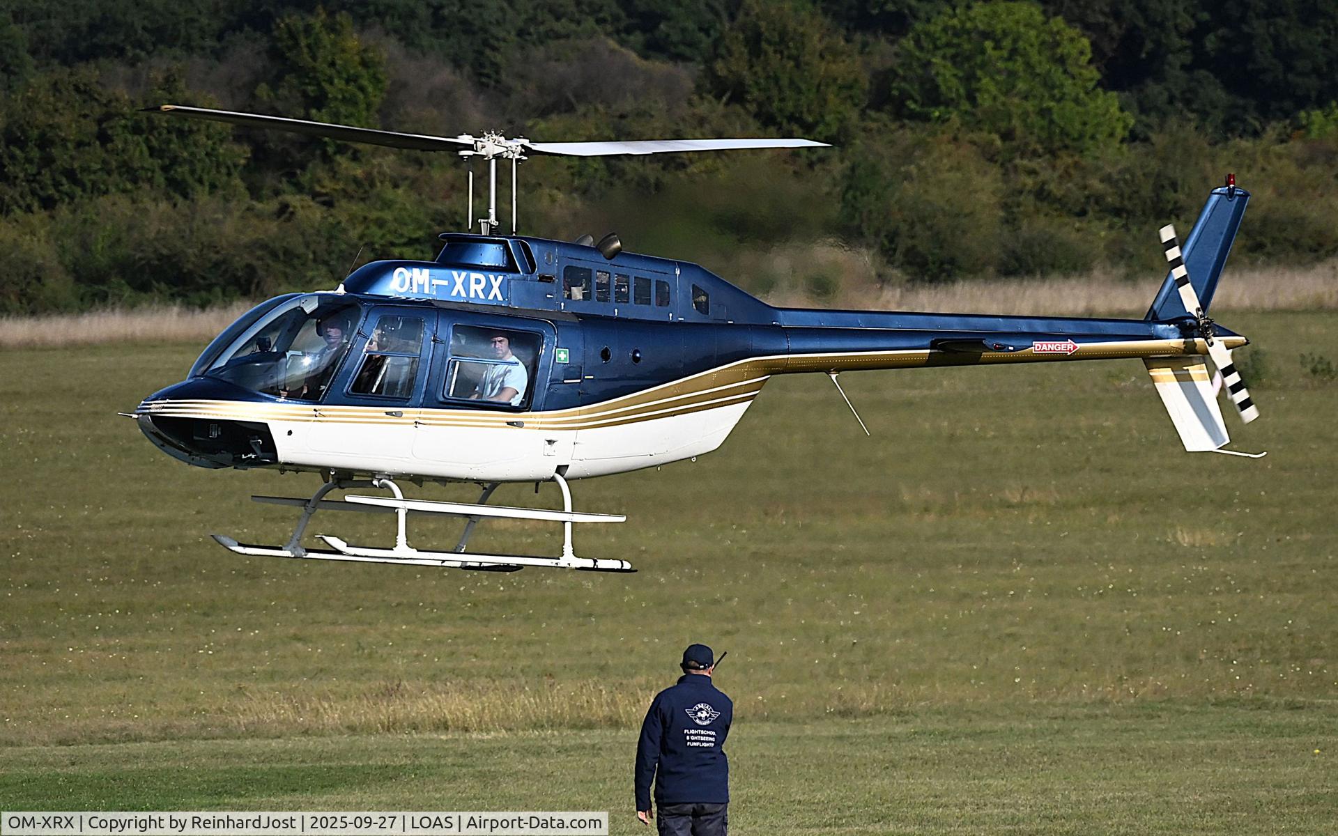 OM-XRX, Agusta-Bell 206B JetRanger III C/N 8720, JetRanger OM-XRX (ex OH-HAT) touches down after a joy-flight at Flugplatzfest Spitzerberg, Austria